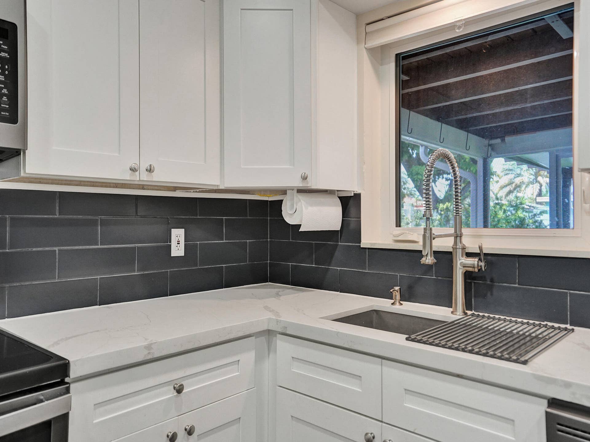 4309 JOHNSON Street, Hollywood, FL 33021 Kitchen window overlooking patio