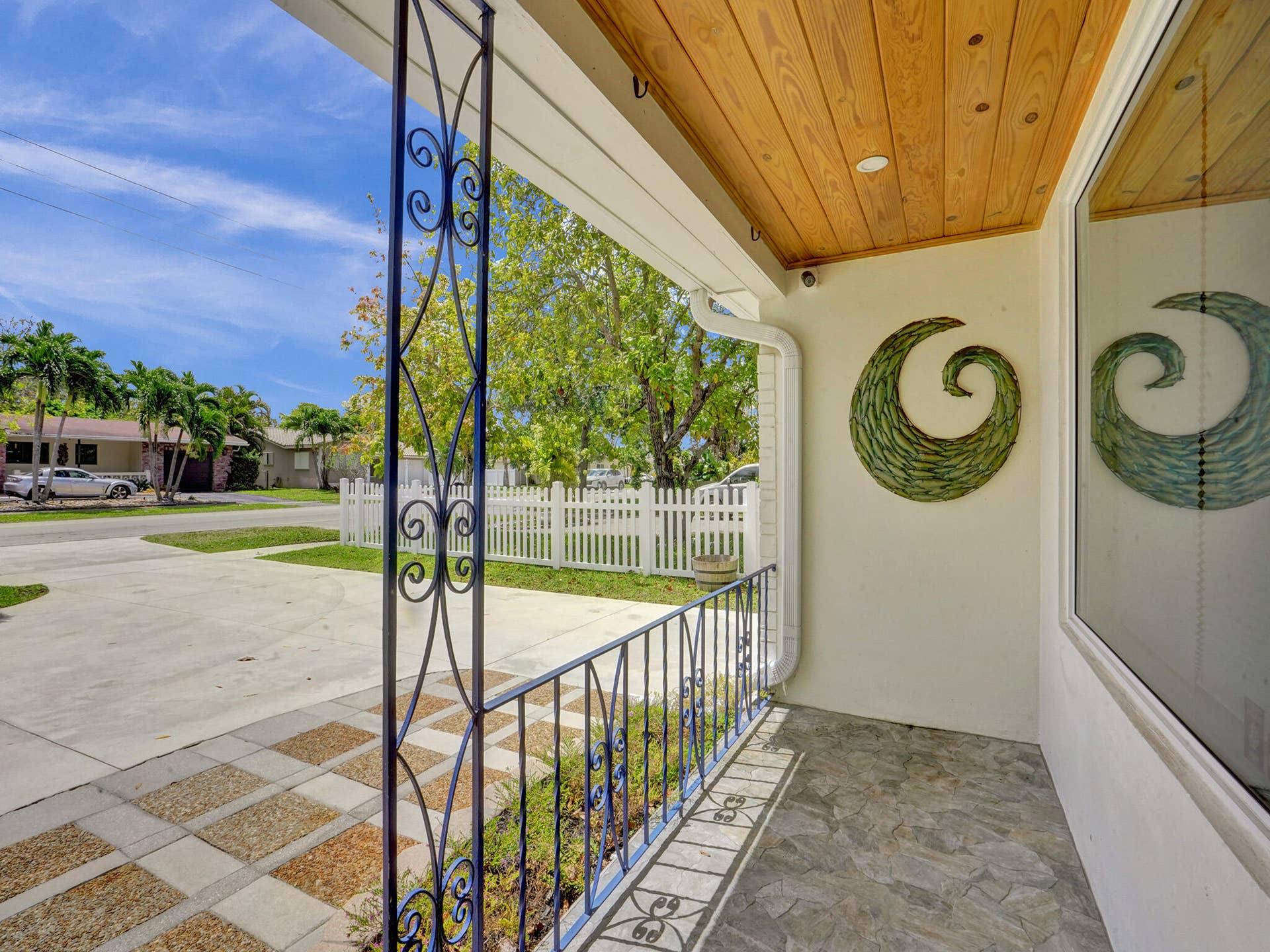 4309 JOHNSON Street, Hollywood, FL 33021 Covered front entryway is large and perfect for greeting guests even when it rains.