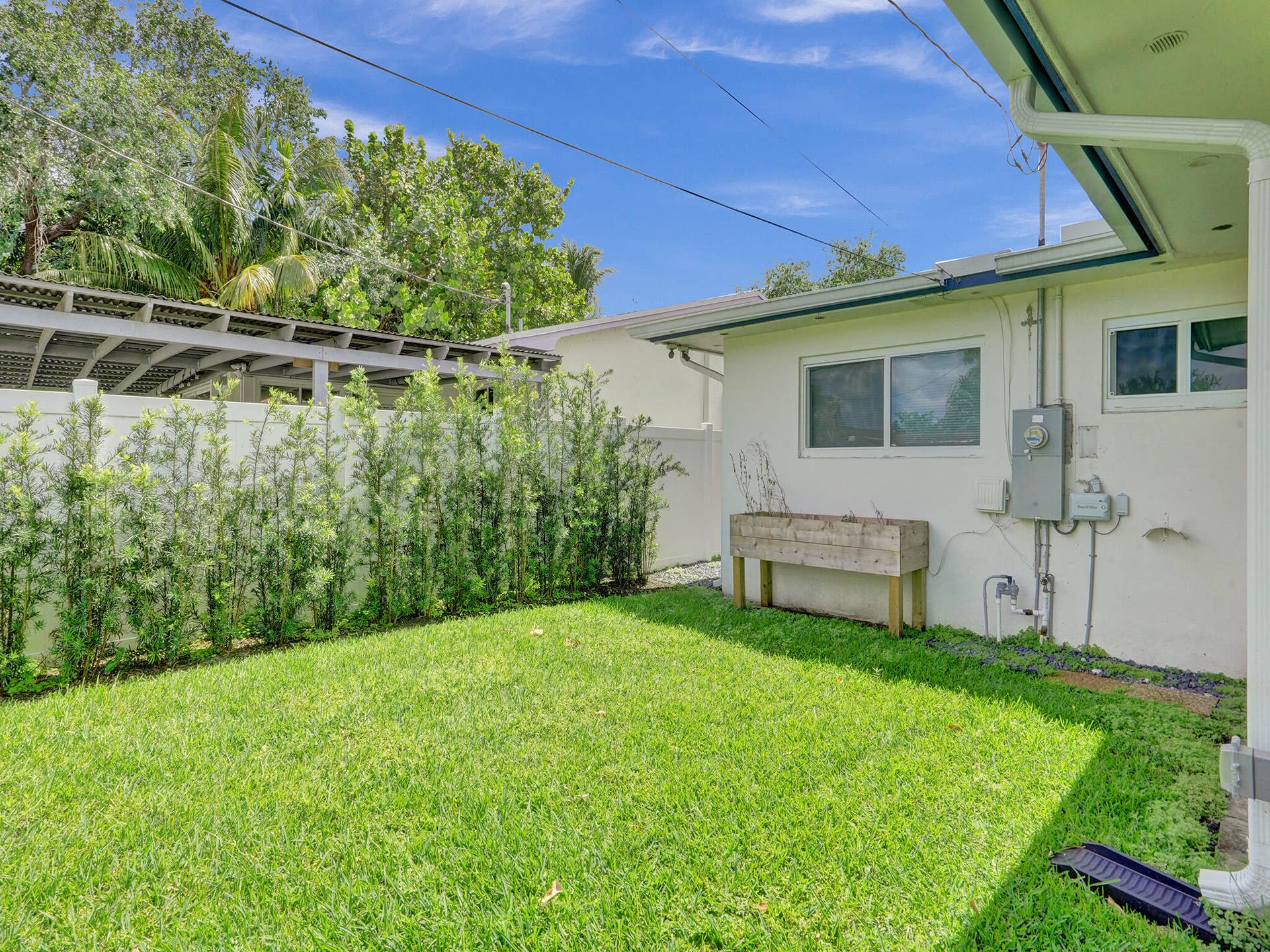 4309 JOHNSON Street, Hollywood, FL 33021 private lawn & gardening area off the rear patio