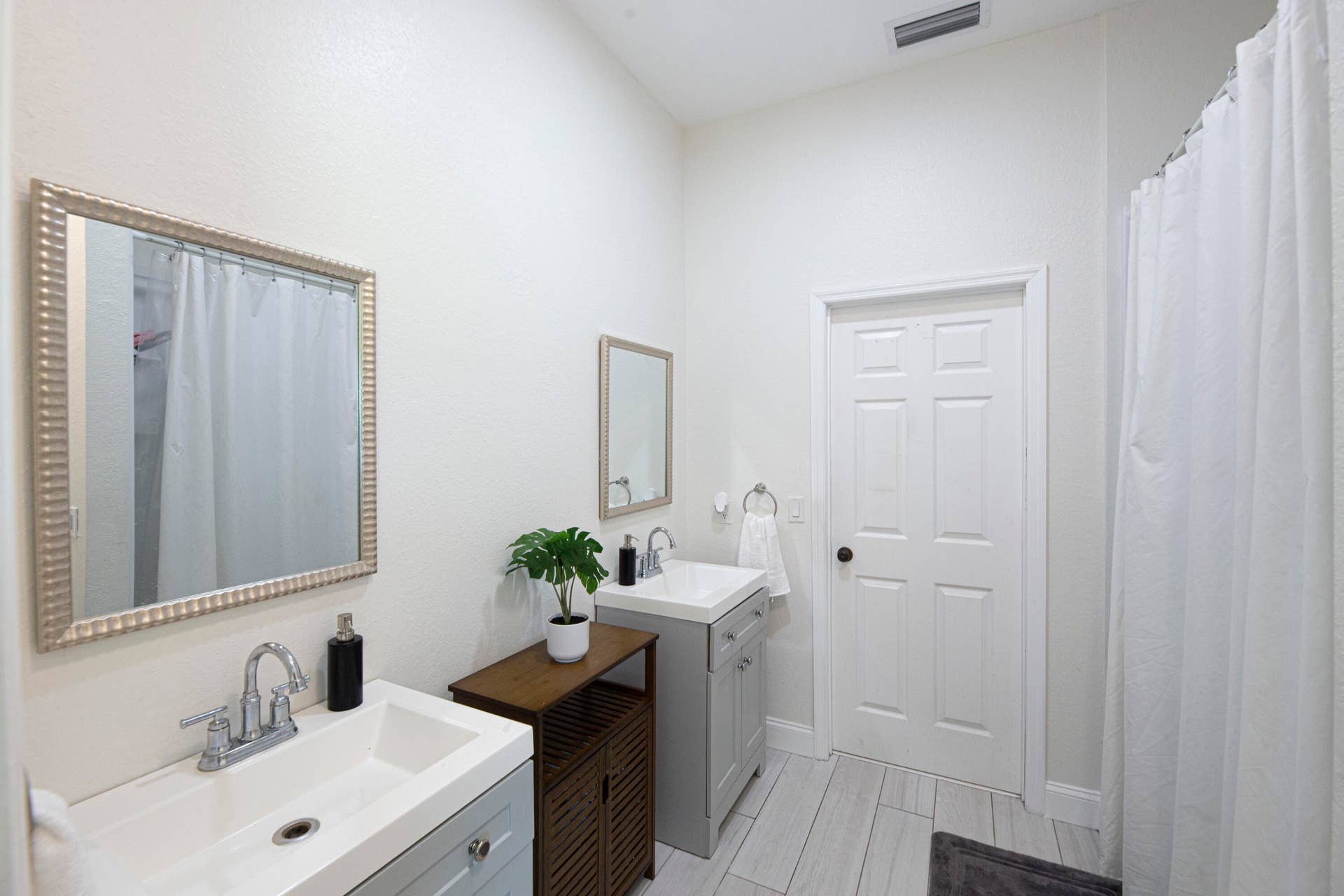 Bathroom with vanity and shower