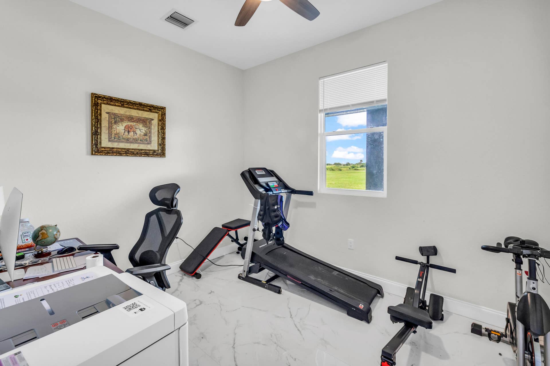 Dedicated office, currently set up as a home gym