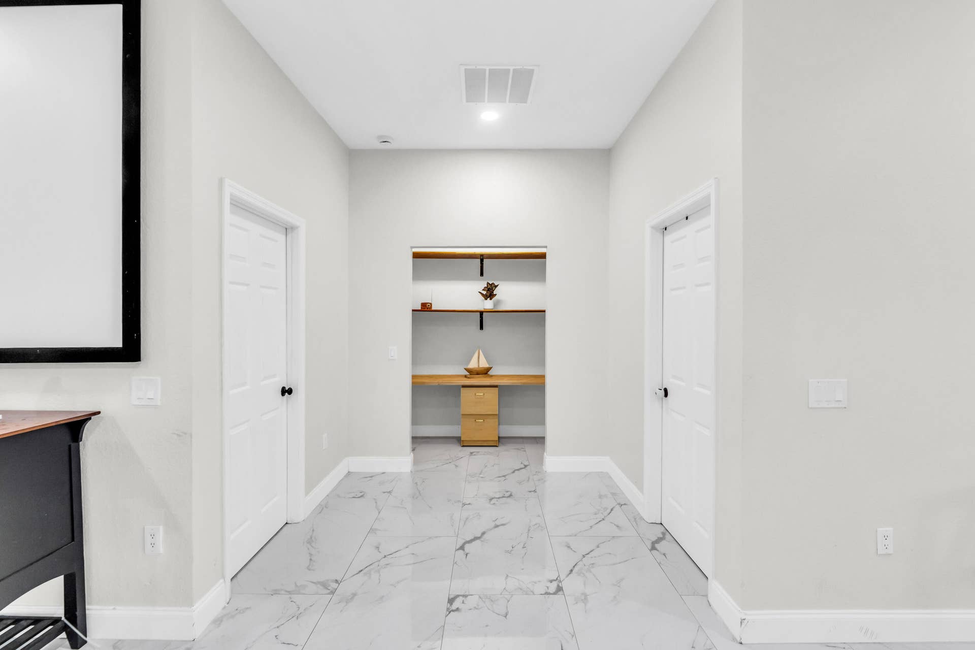 Hallway with built-in desk nook