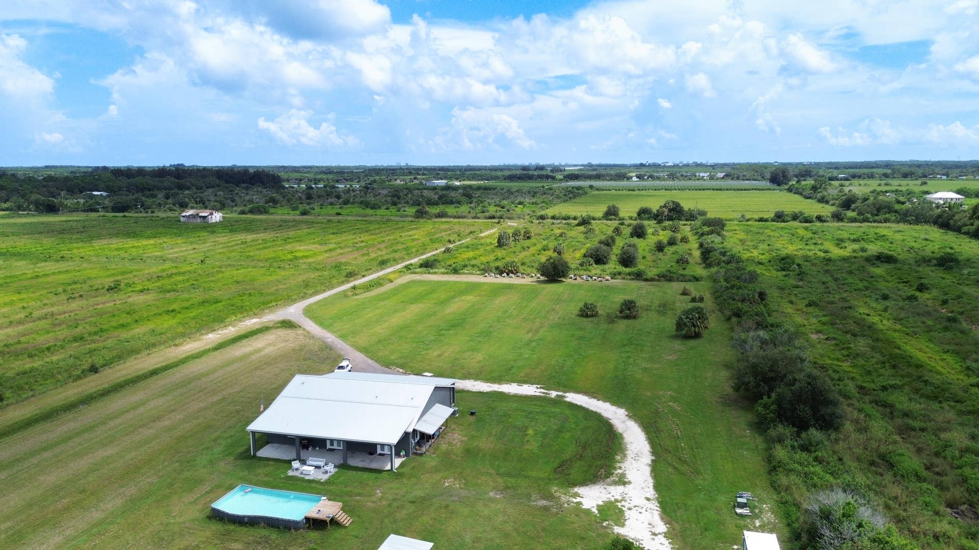 Aerial of the home and surrounding acreage