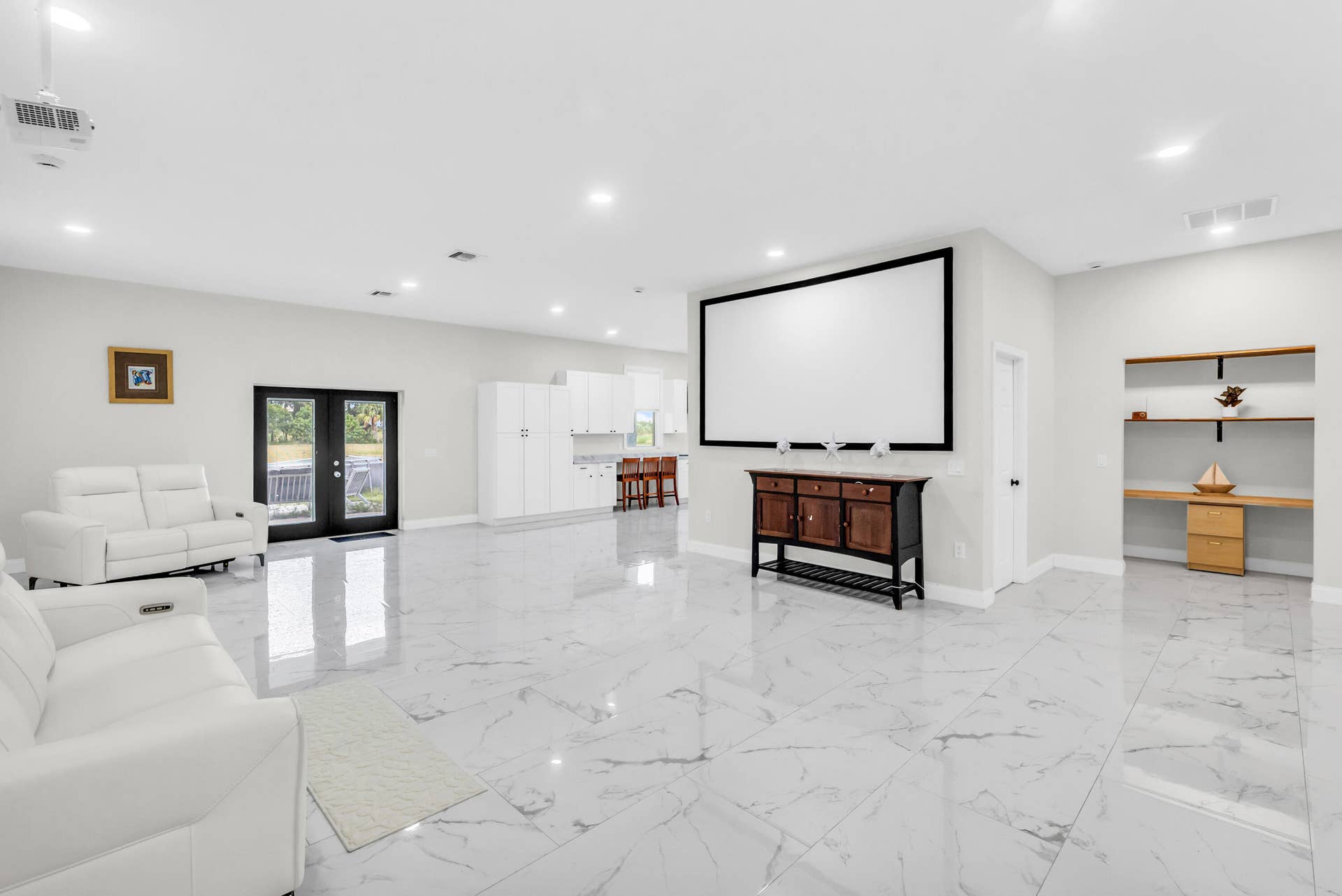 Open living area with French doors to the porch