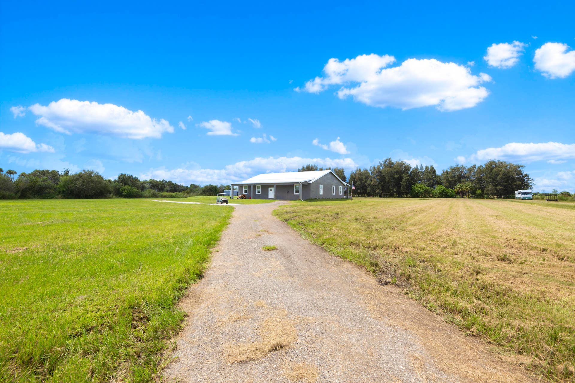 Long private driveway leading to the home