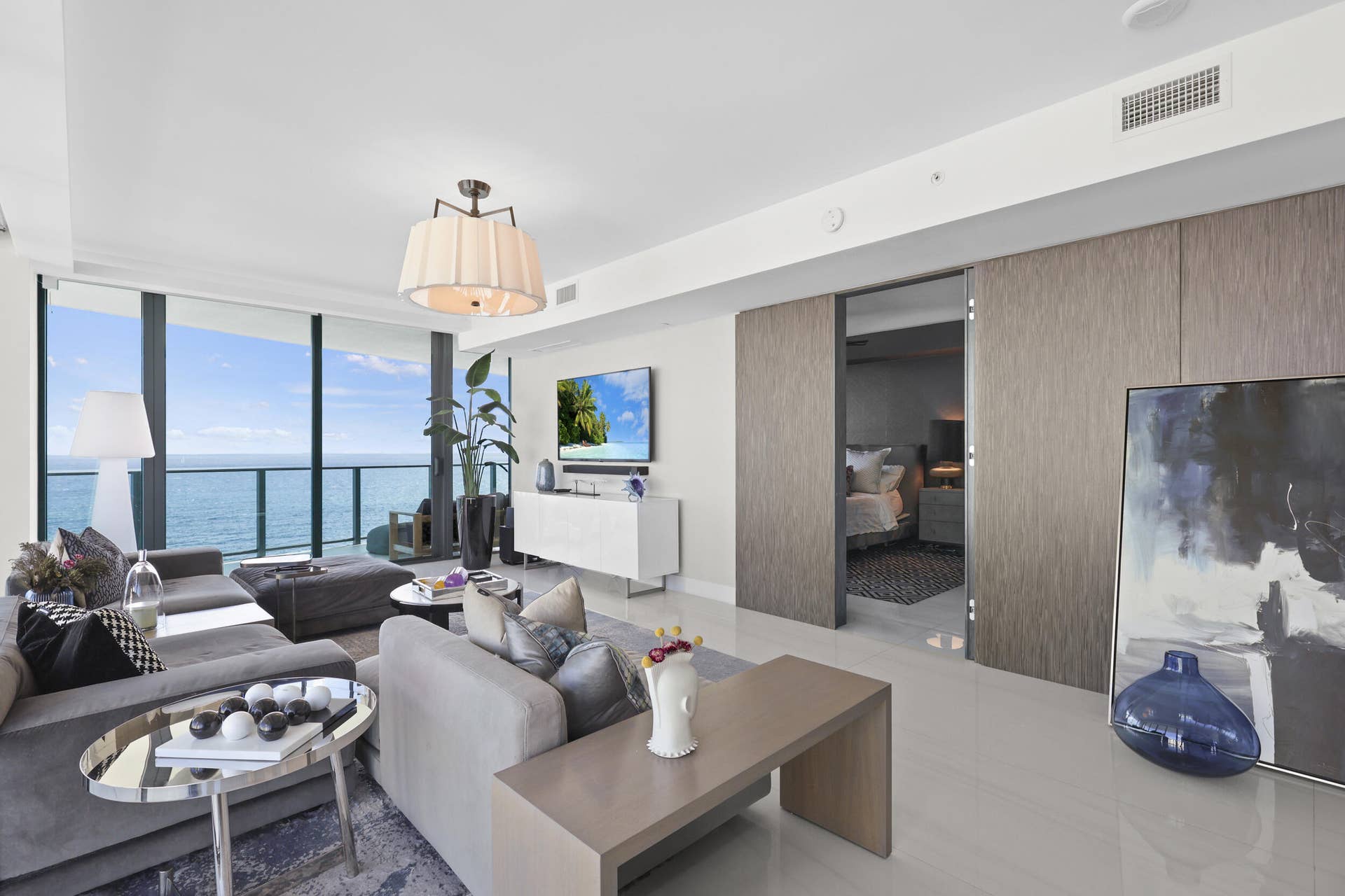 730 N Ocean Boulevard, Pompano Beach, FL 33062 Beyond the custom concealed doors awaits a private oceanfront suite, where timeless elegance meets breathtaking Atlantic views.