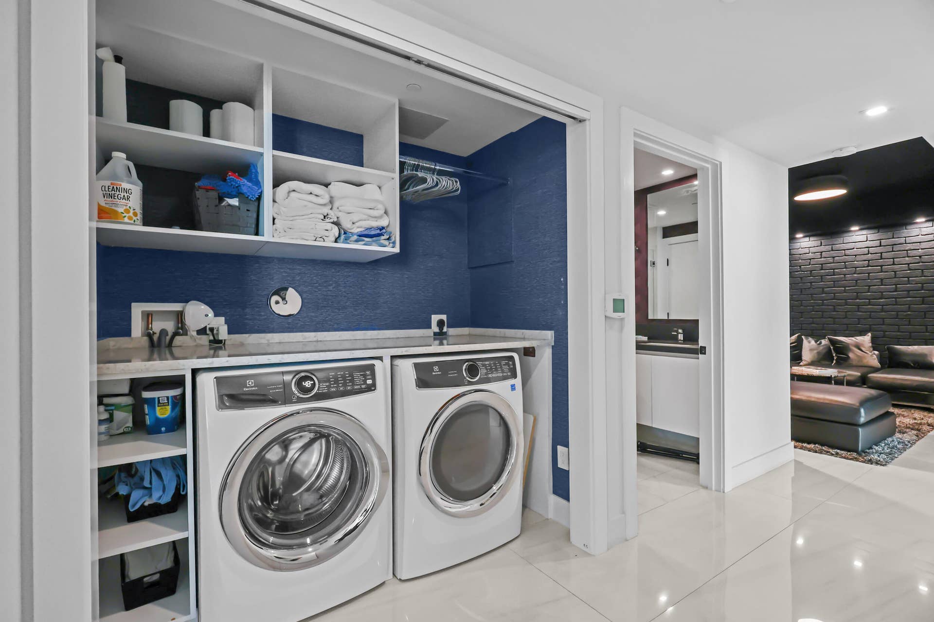 730 N Ocean Boulevard, Pompano Beach, FL 33062 A full size laundry closet offers hidden functionality.
