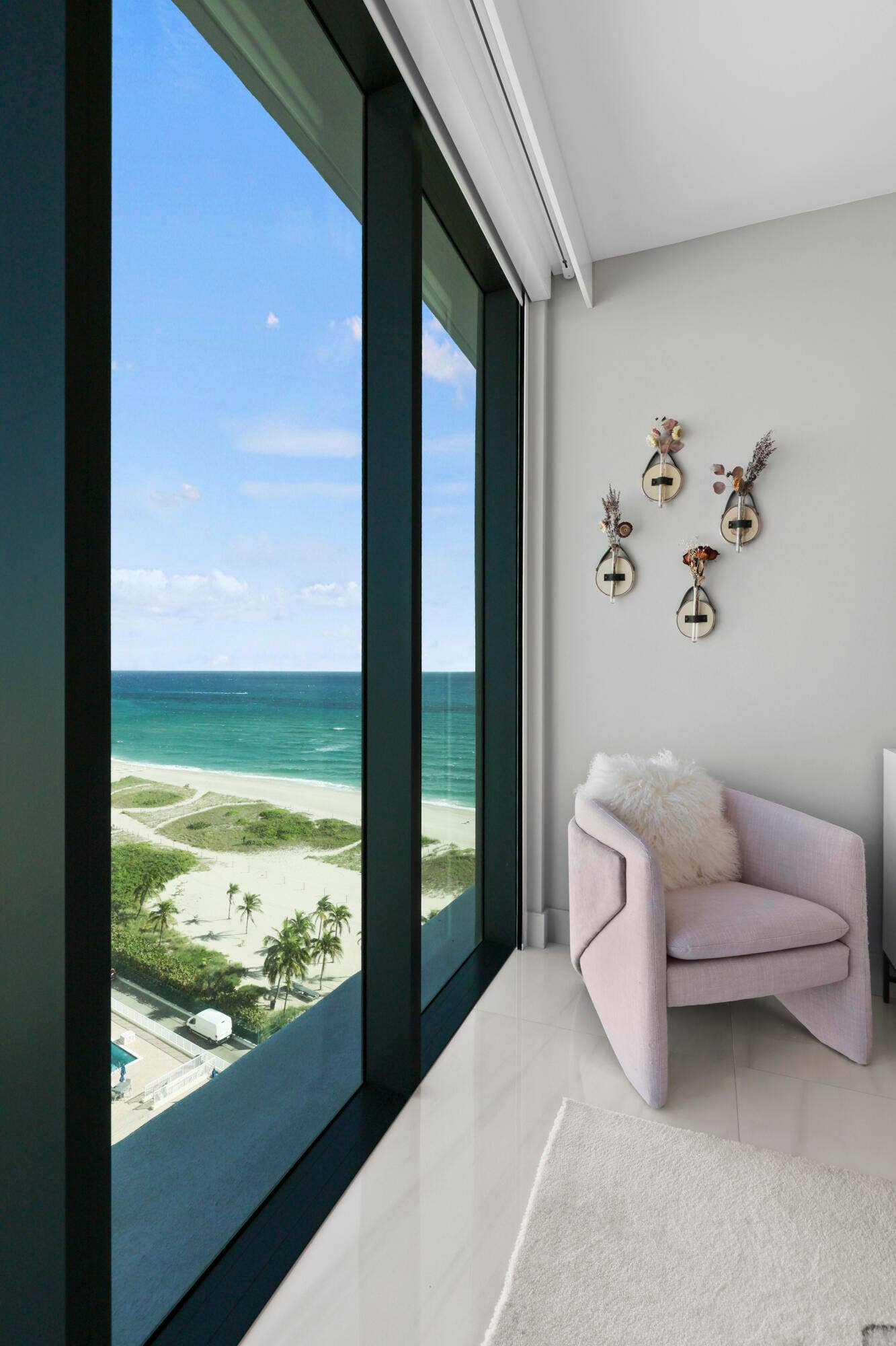 730 N Ocean Boulevard, Pompano Beach, FL 33062 Guest bedroom 1 features more designer touches, automated shades & blinds, customized closet, and ensuite bathroom.