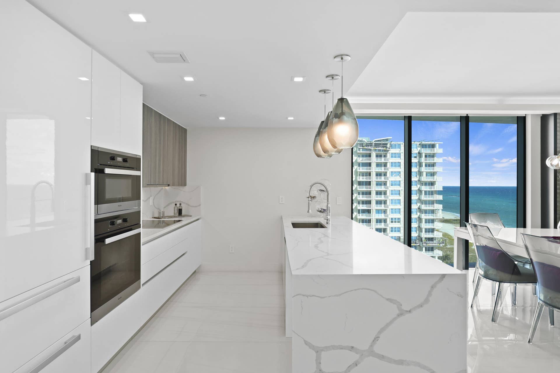 730 N Ocean Boulevard, Pompano Beach, FL 33062 Culinary enthusiasts will enjoy a true chef's kitchen, highlighted with custom Italian cabinetry, Quartz countertops, and luxury (SubZero & Miele) appliances.