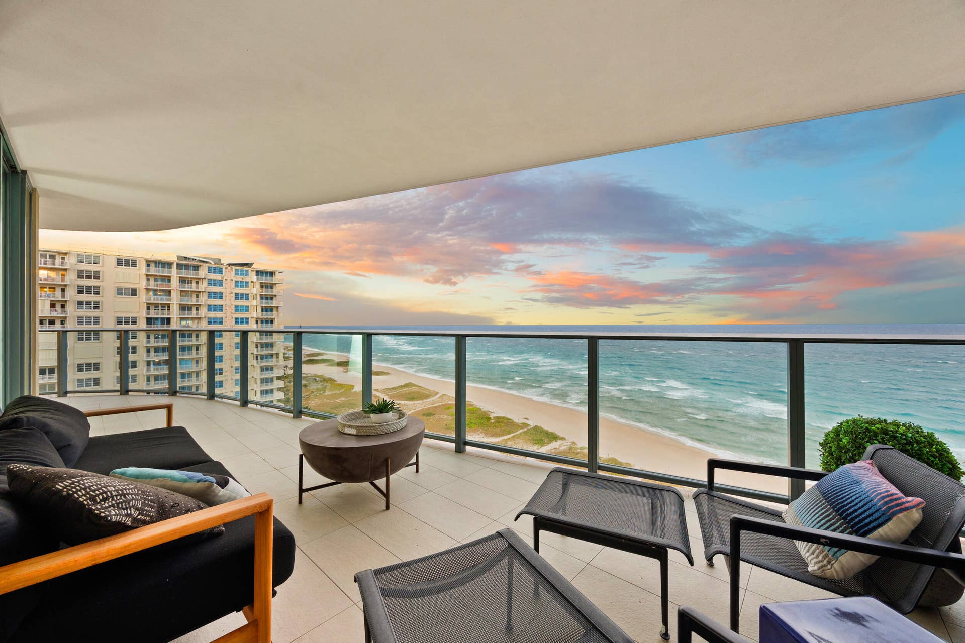 730 N Ocean Boulevard, Pompano Beach, FL 33062 The expansive wraparound balcony offers an exceptional amount of outdoor living space and a peaceful setting to unwind with family and friends. As evening falls, enjoy colorful sunsets over the Intracoastal while the Atlantic fades into twilight and ocean breezes move gently through the air.