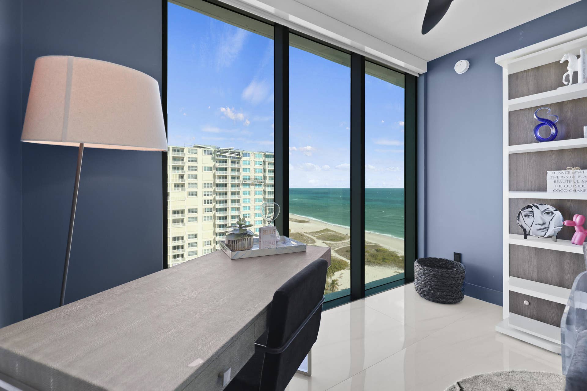 730 N Ocean Boulevard, Pompano Beach, FL 33062 Guest bedroom 2 features more designer touches, automated blinds, customized closet, murphy bed and ensuite bathroom.