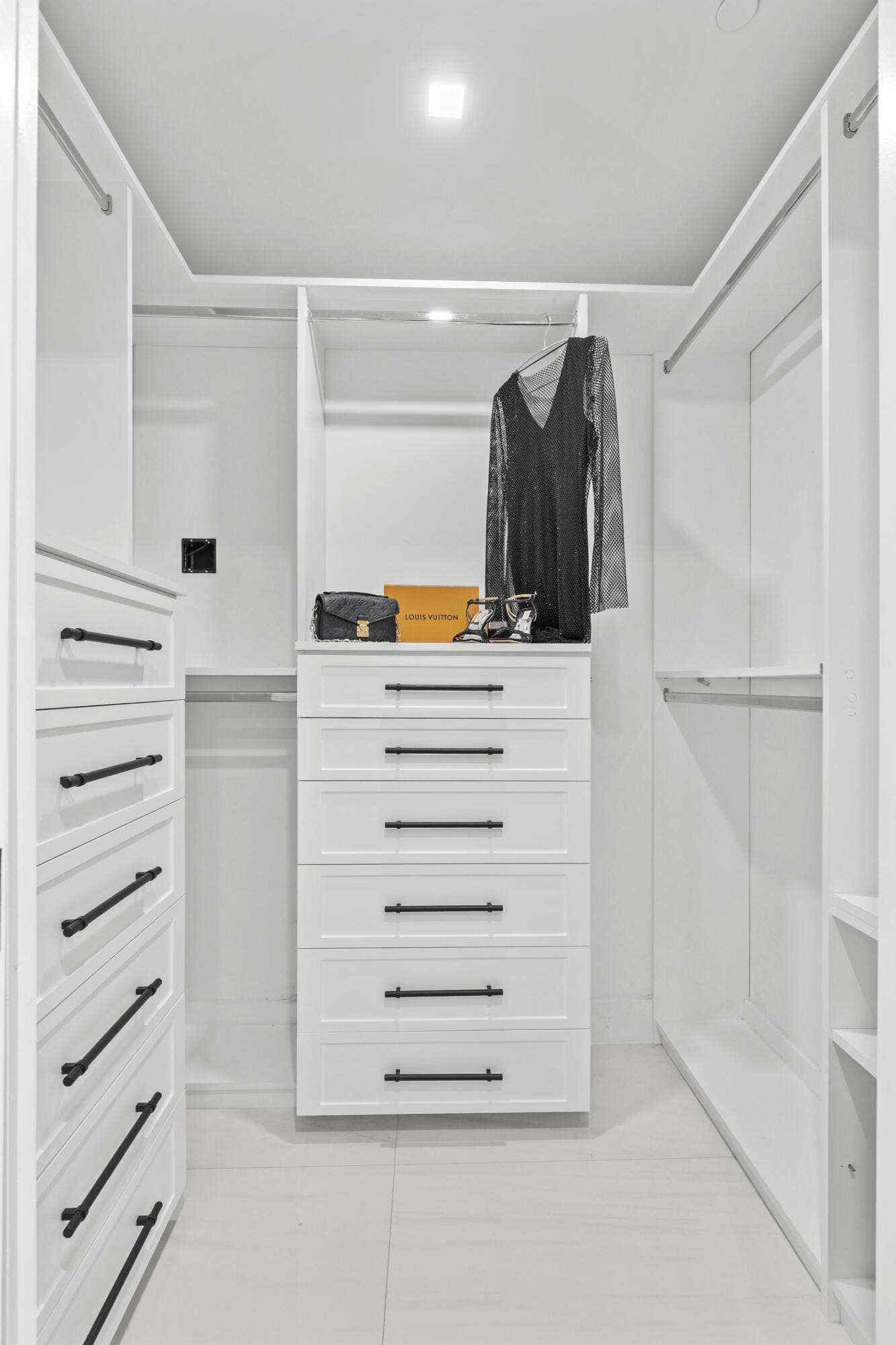 730 N Ocean Boulevard, Pompano Beach, FL 33062 Fully customized cabinetry adorn the his & hers closets providing maximum storage and function.