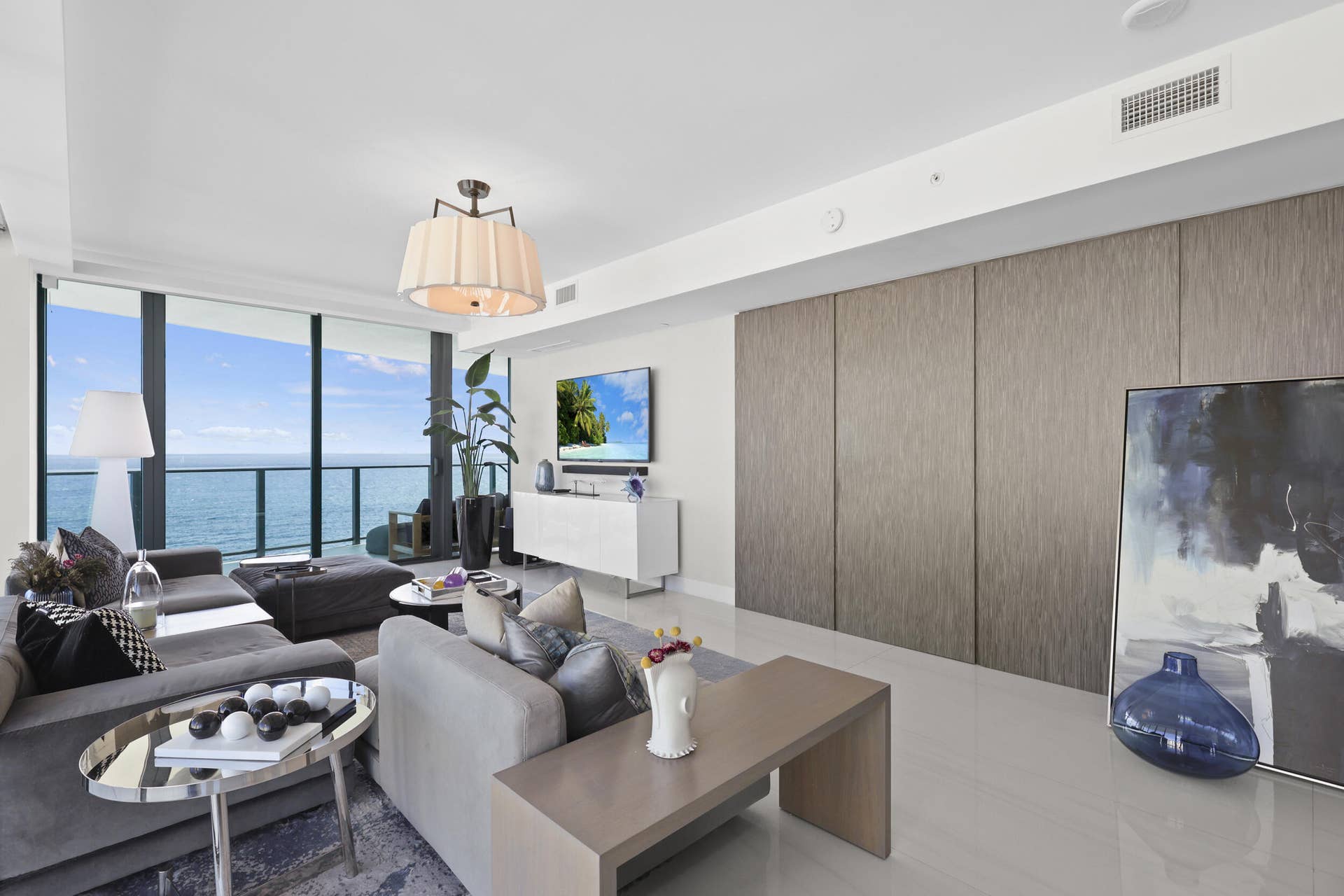 730 N Ocean Boulevard, Pompano Beach, FL 33062 Beyond the custom concealed doors awaits a private oceanfront suite, where timeless elegance meets breathtaking Atlantic views.