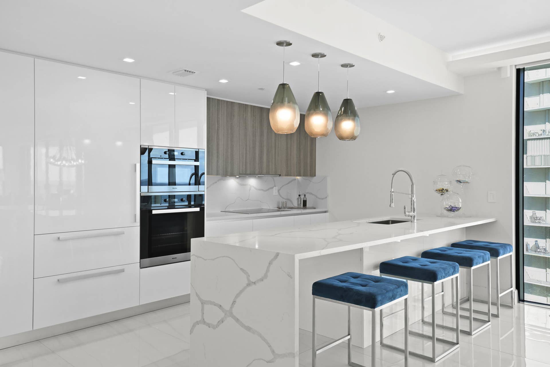 730 N Ocean Boulevard, Pompano Beach, FL 33062 Culinary enthusiasts will enjoy a true chef's kitchen, highlighted with custom Italian cabinetry, Quartz countertops, and luxury (SubZero & Miele) appliances.