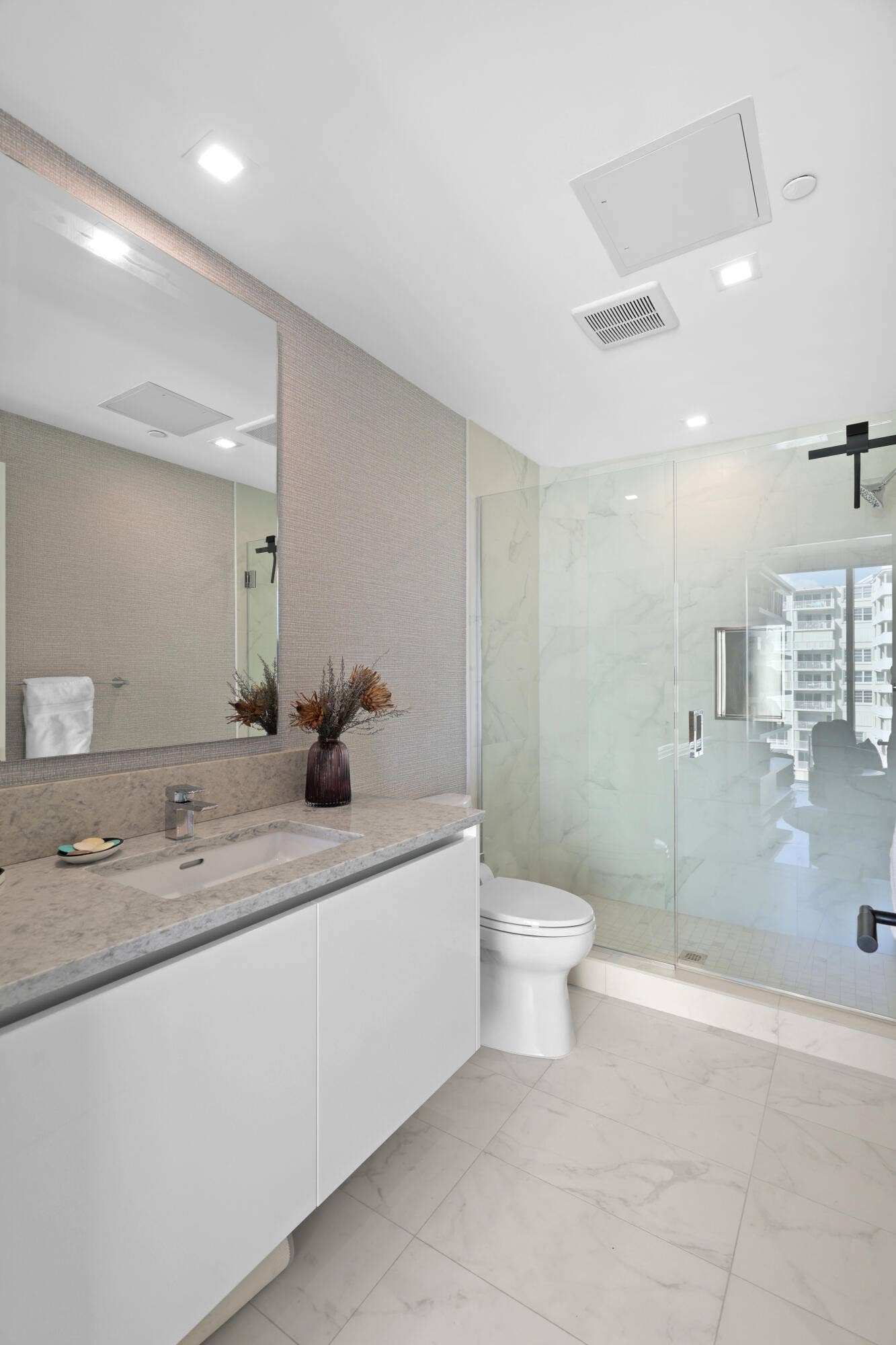 730 N Ocean Boulevard, Pompano Beach, FL 33062 Guest bedroom 2 features more designer touches, automated blinds, customized closet, murphy bed and ensuite bathroom.