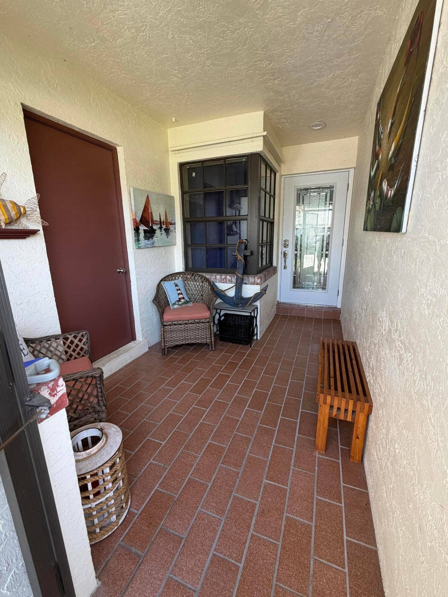 Jupiter, FL 33458 Enclosed front porch with door to garage