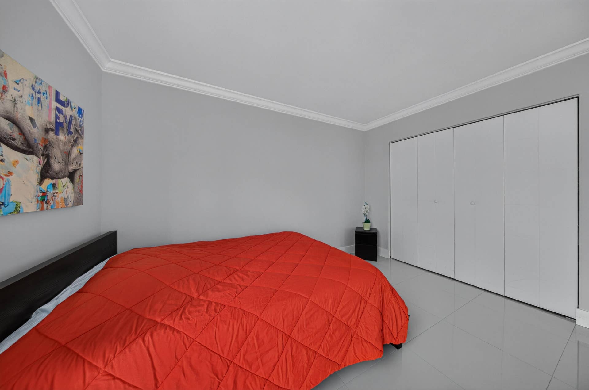 20379 W COUNTRY CLUB Drive, #1139, Aventura, FL 33180 Recessed lighting, crown molding, gray wall tones, large bi-fold closet doors, and tile flooring