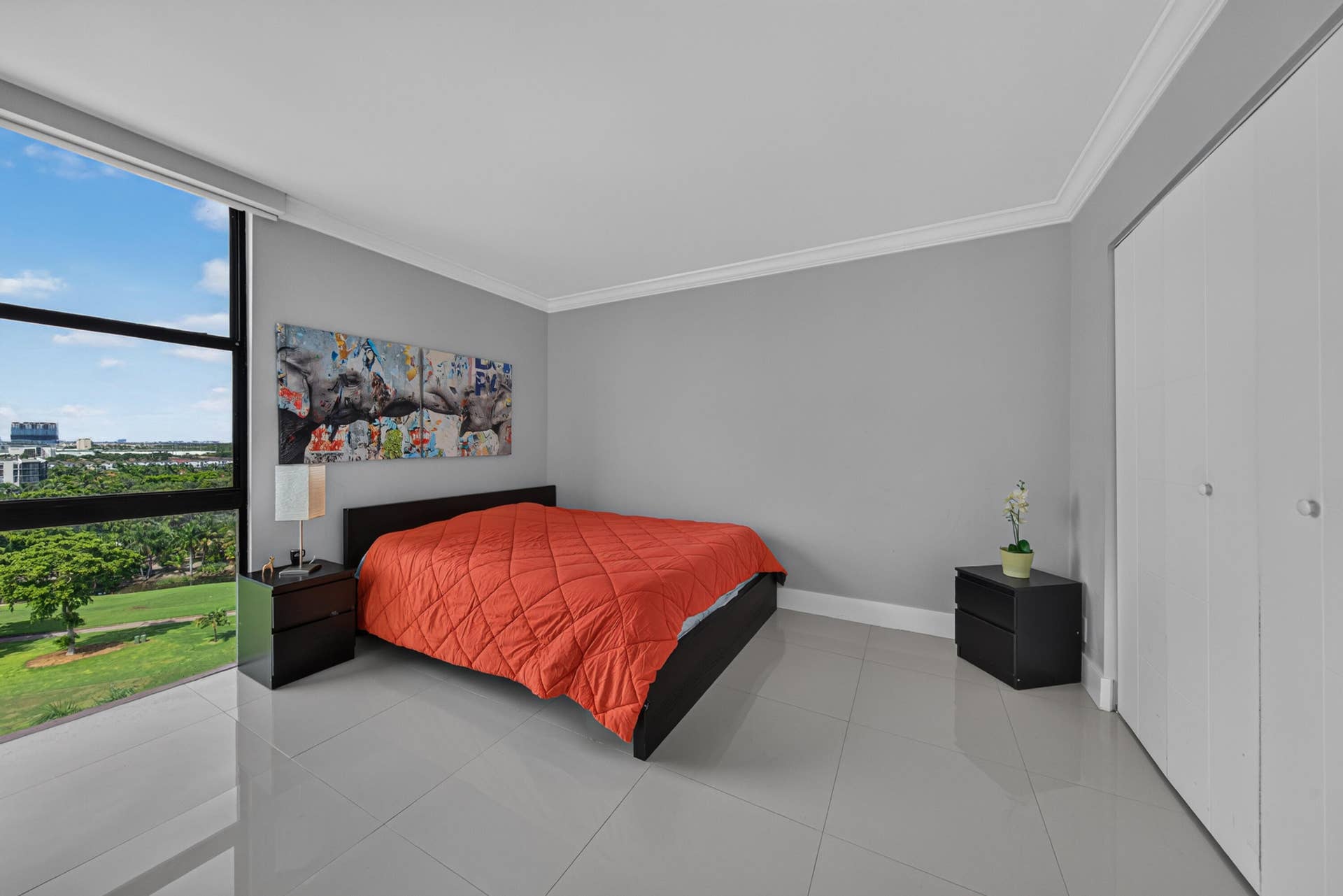 20379 W COUNTRY CLUB Drive, #1139, Aventura, FL 33180 Spacious bedroom featuring polished tile flooring, floor-to-ceiling windows with natural light, and panoramic landscape vistas