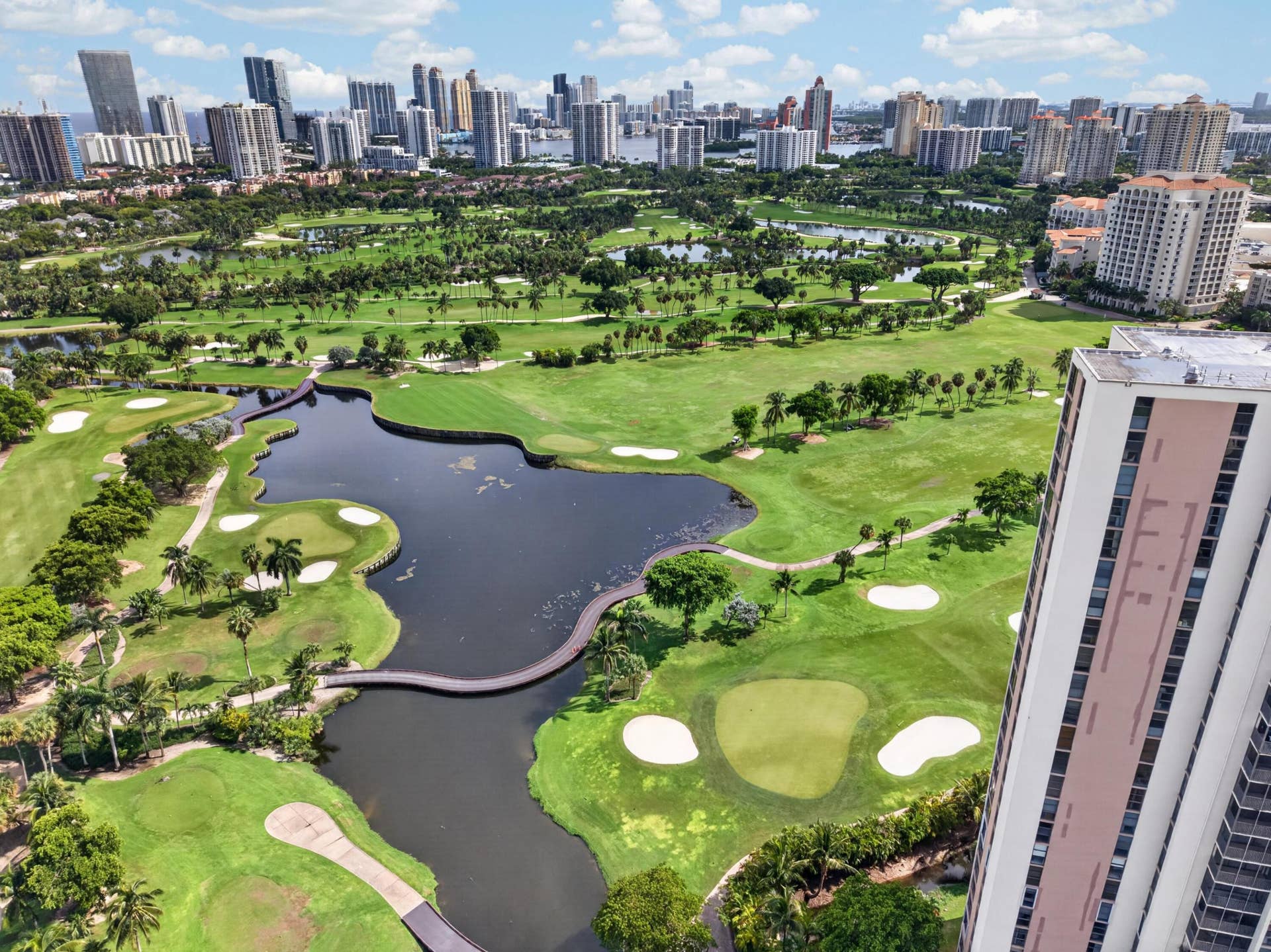 20379 W COUNTRY CLUB Drive, #1139, Aventura, FL 33180 Expansive golf course with water features, mature palm trees, and manicured greens