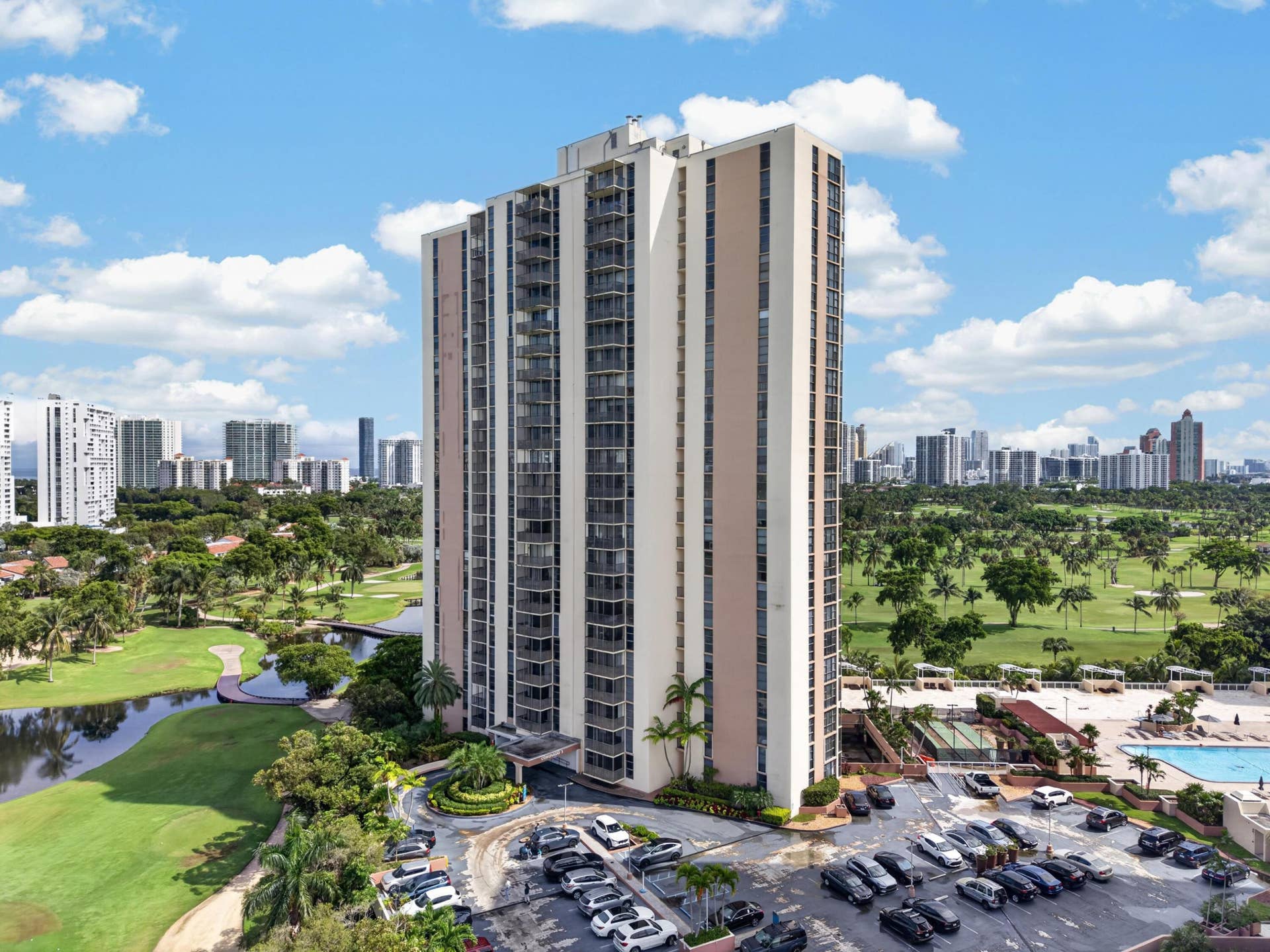 20379 W COUNTRY CLUB Drive, #1139, Aventura, FL 33180 Modern high-rise residential tower featuring vertical architectural lines and contemporary facade design