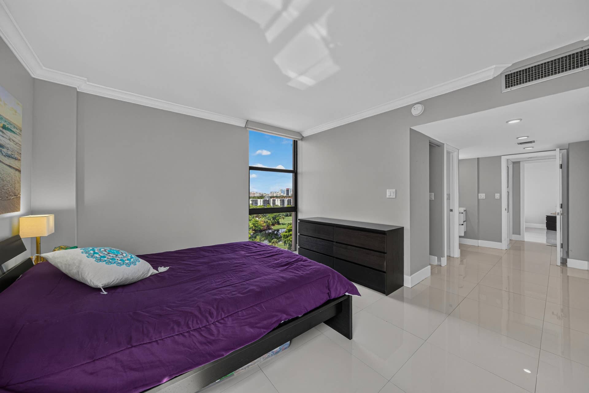 20379 W COUNTRY CLUB Drive, #1139, Aventura, FL 33180 Expansive window overlooking cityscape, sleek tile flooring, recessed lighting, crown molding, and built-in air conditioning vents