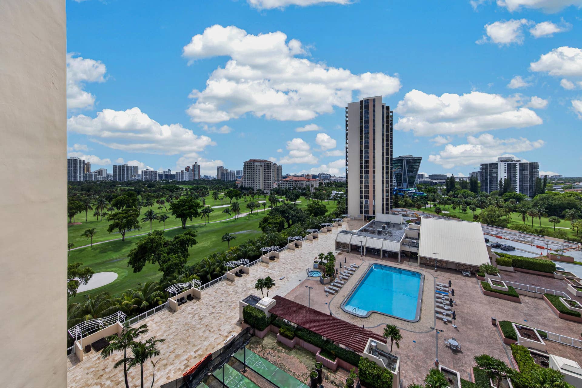 20379 W COUNTRY CLUB Drive, #1139, Aventura, FL 33180 Expansive golf course, resort-style swimming pool, surrounding urban landscape, high-rise building, tennis court