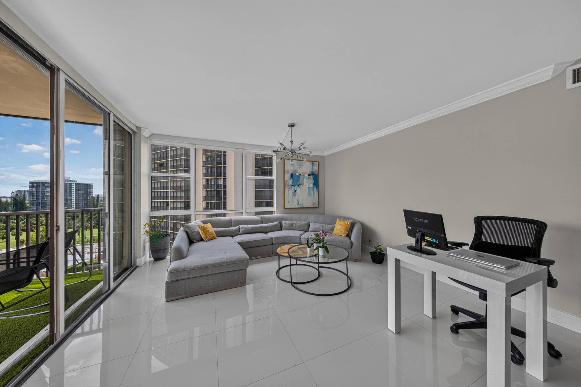 20379 W COUNTRY CLUB Drive, #1139, Aventura, FL 33180 Expansive sliding glass doors, large windows, crown molding, and polished tile flooring