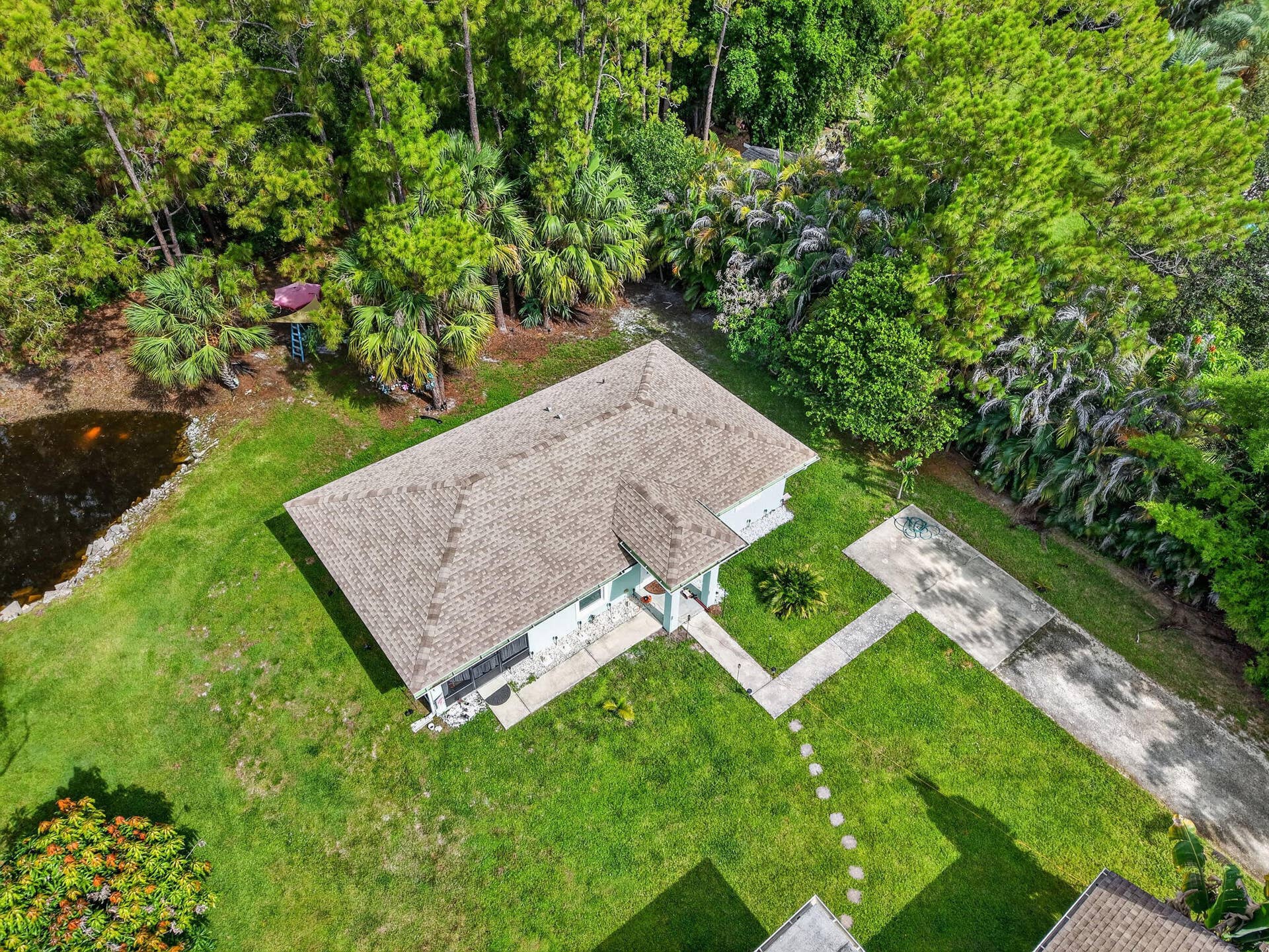16143 127TH Drive N, Jupiter, FL 33478 41-web-or-mls-DJI_20260702101340_0169_D_