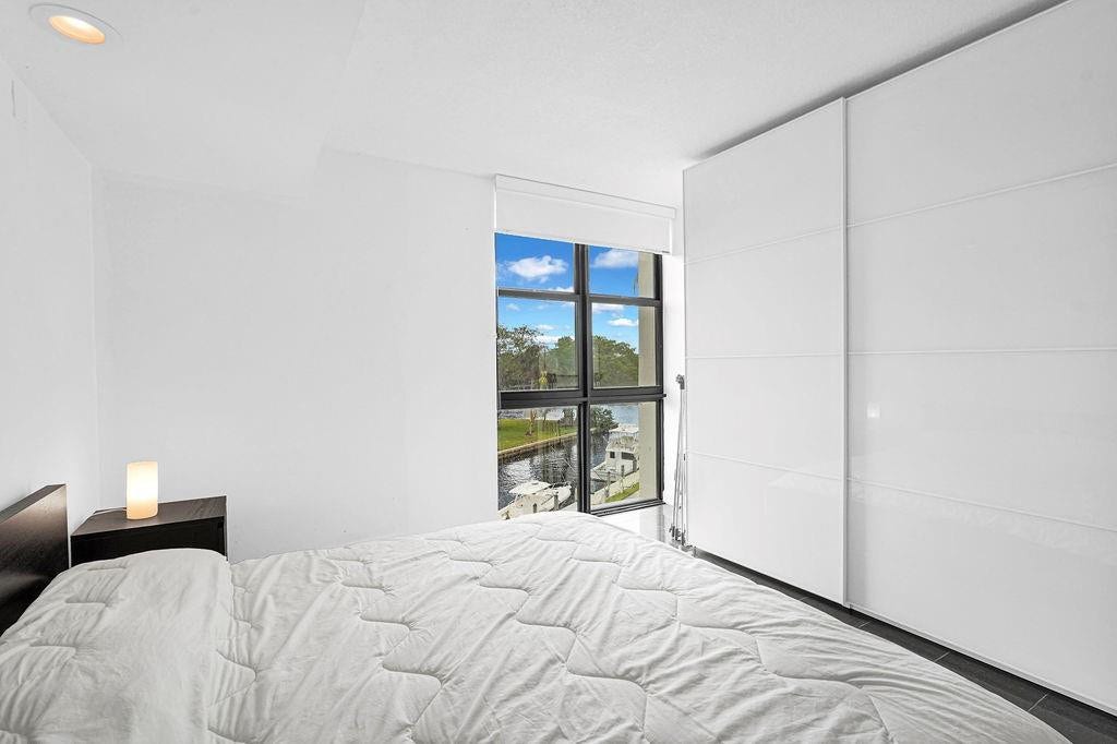 1350 River Reach Drive, #417, Fort Lauderdale, FL 33315 Primary Bedroom with view of boats on canal