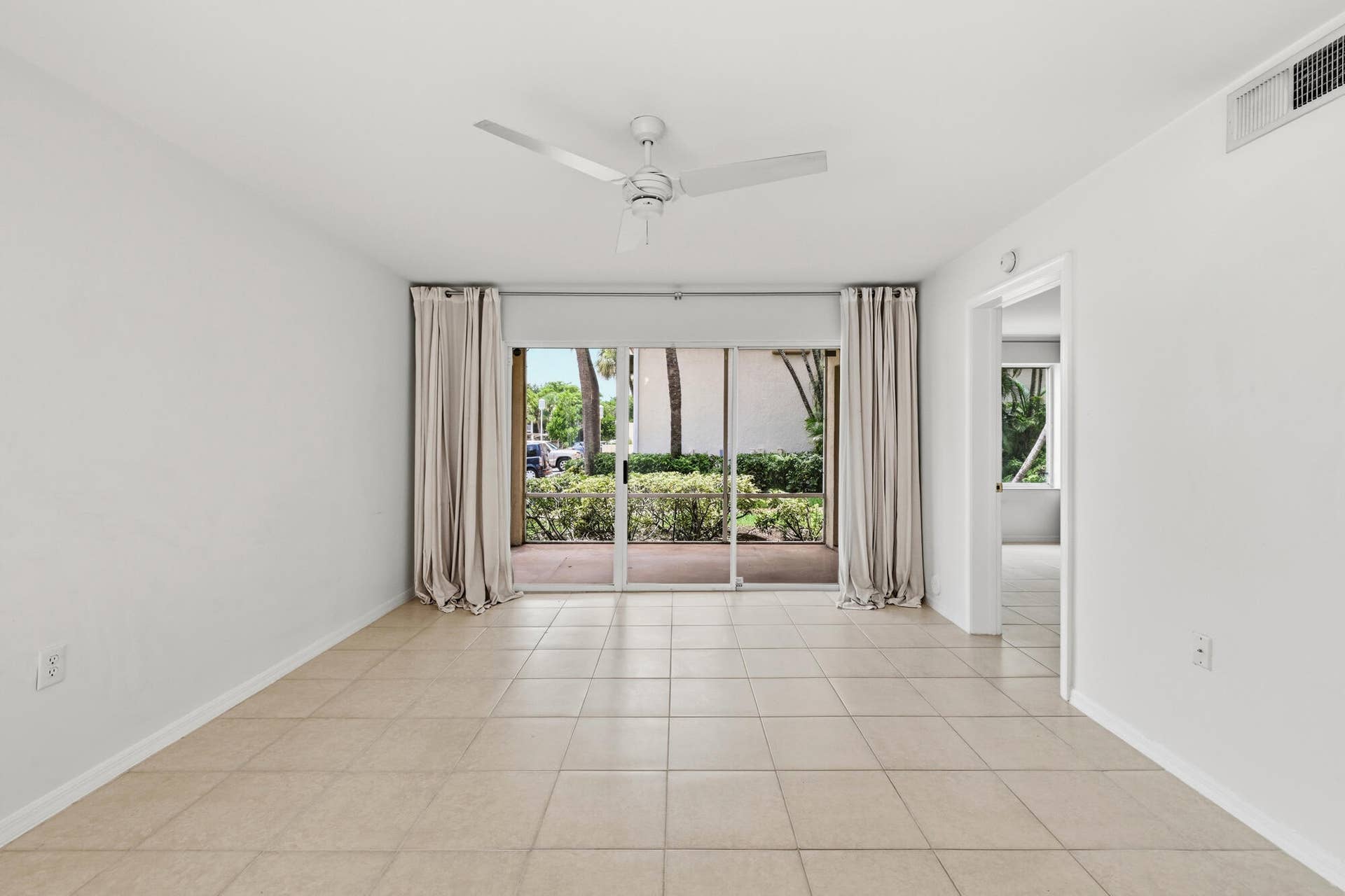 20101 Glenmoor Drive, West Palm Beach, West Palm Beach, FL 33409 Living area with tile flooring and a ceiling fan