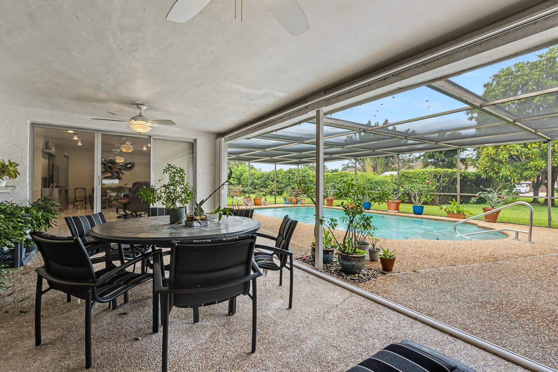 415 SAILBOAT Circle, Weston, FL 33326 Pool area with dining
