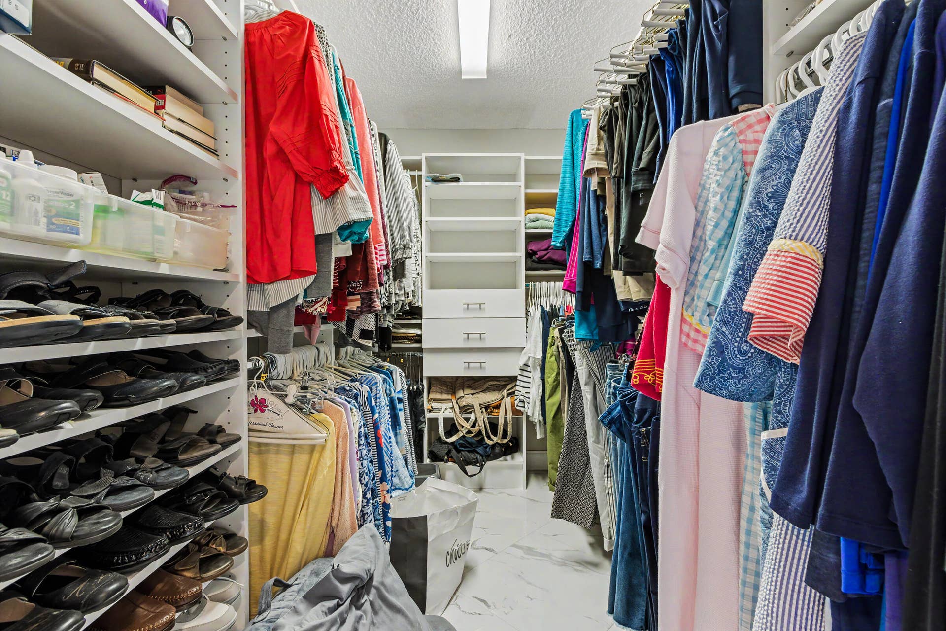 415 SAILBOAT Circle, Weston, FL 33326 Primary walk-in closet with built-in storage