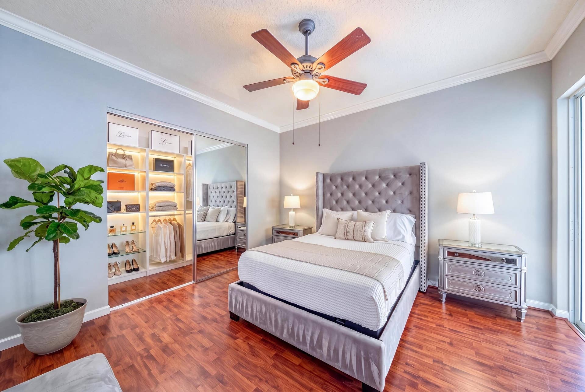 254 Marlberry Circle, Jupiter, FL 33458 Primary bedroom with open custom closet and screened patio access (closet virtually staged)