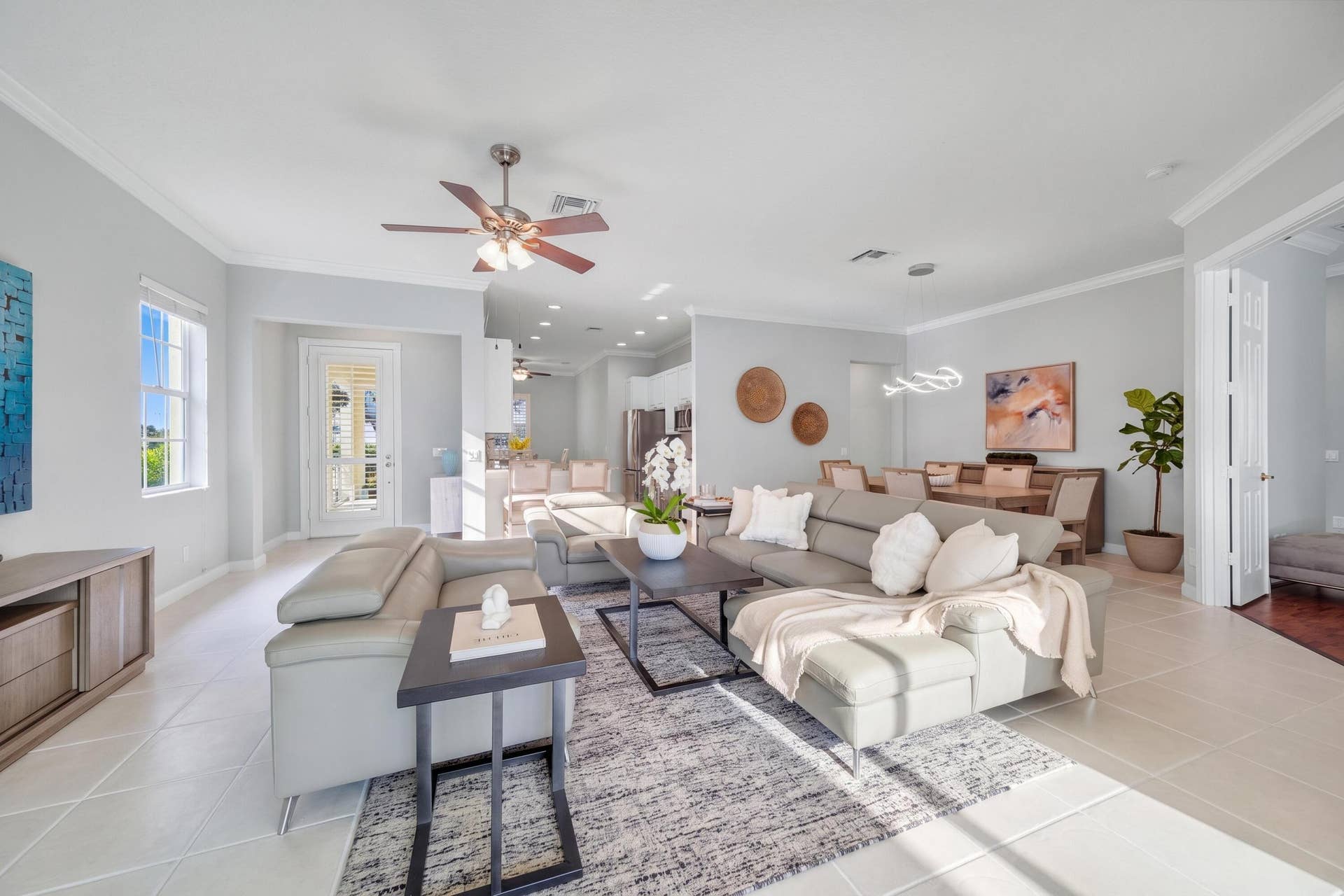 254 Marlberry Circle, Jupiter, FL 33458 Living room open to the kitchen, dining room and primary suite
