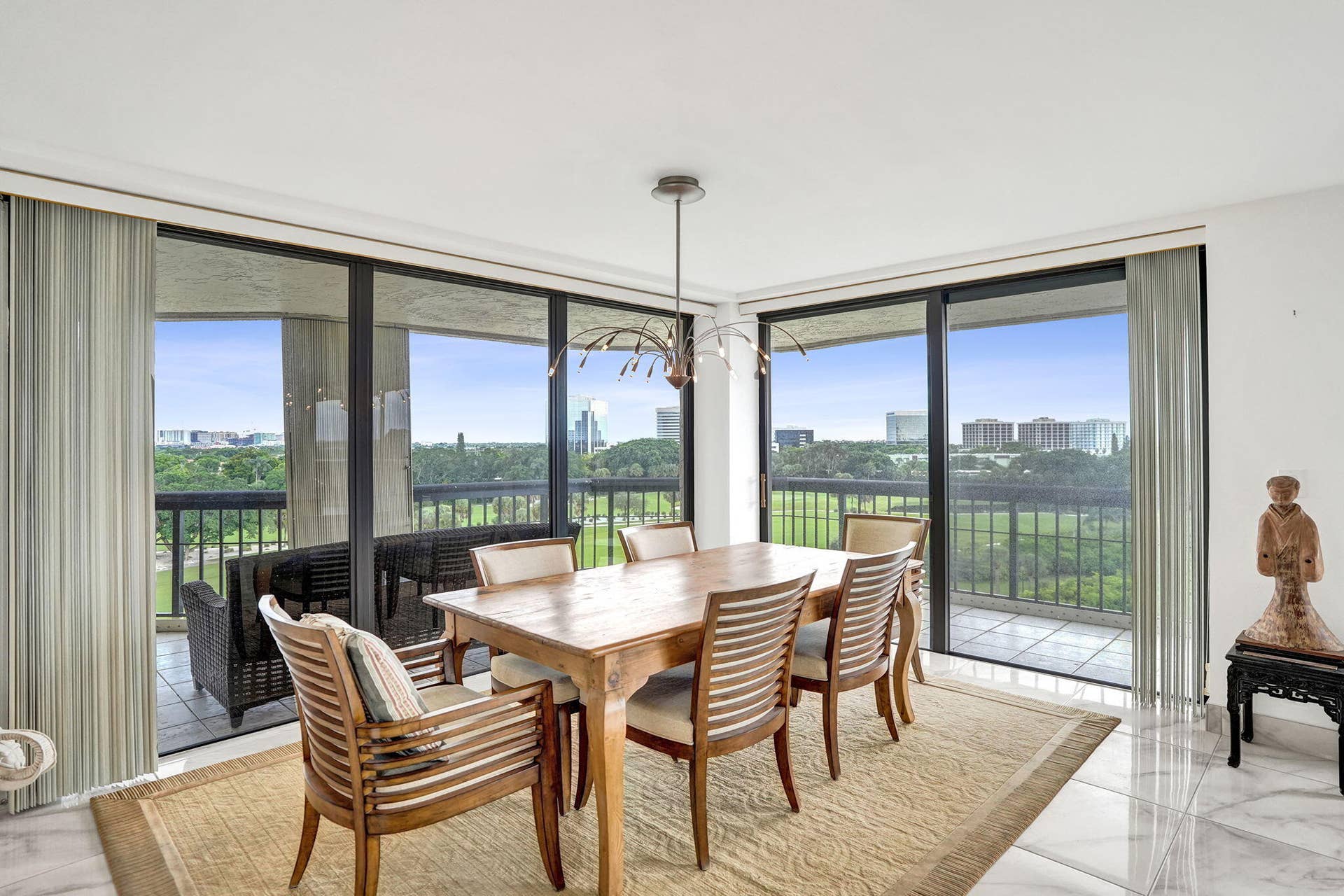 Dining area with floor-to-ceiling sliding doors