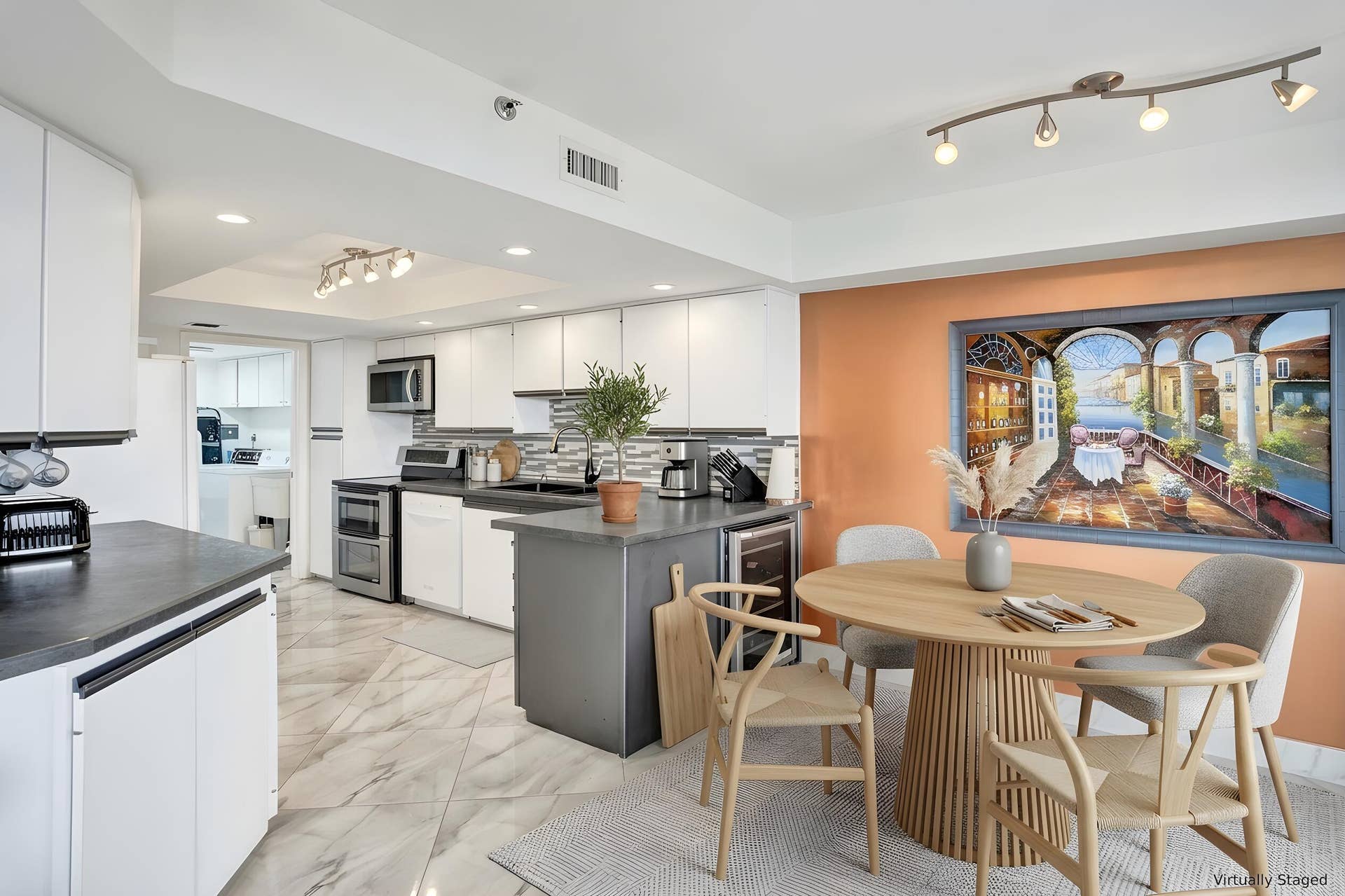 Virtually staged using AI  kitchen and breakfast area