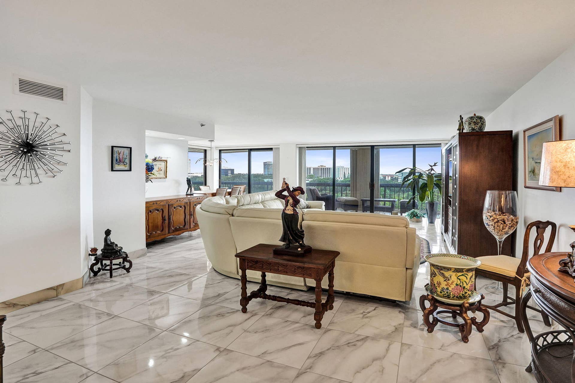 Open-concept living room with balcony views