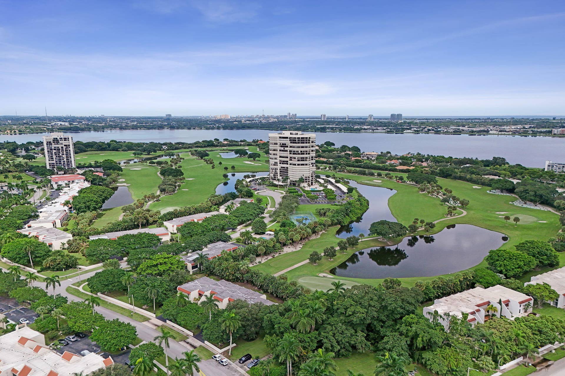 Aerial community view with golf course and waterways