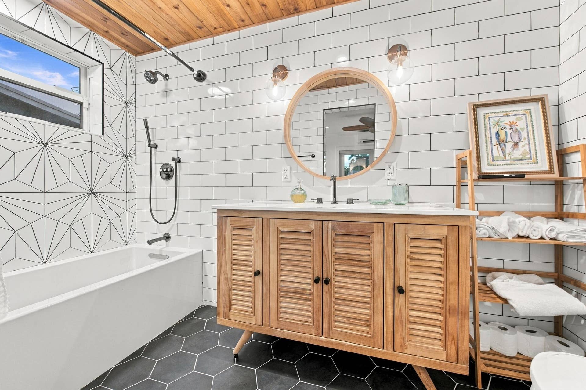2496 BIMINI Lane, Fort Lauderdale, FL 33312 Wood-finish ceiling, white subway tile walls, geometric pattern shower wall tile, deep soaking tub, and hexagon floor tiling