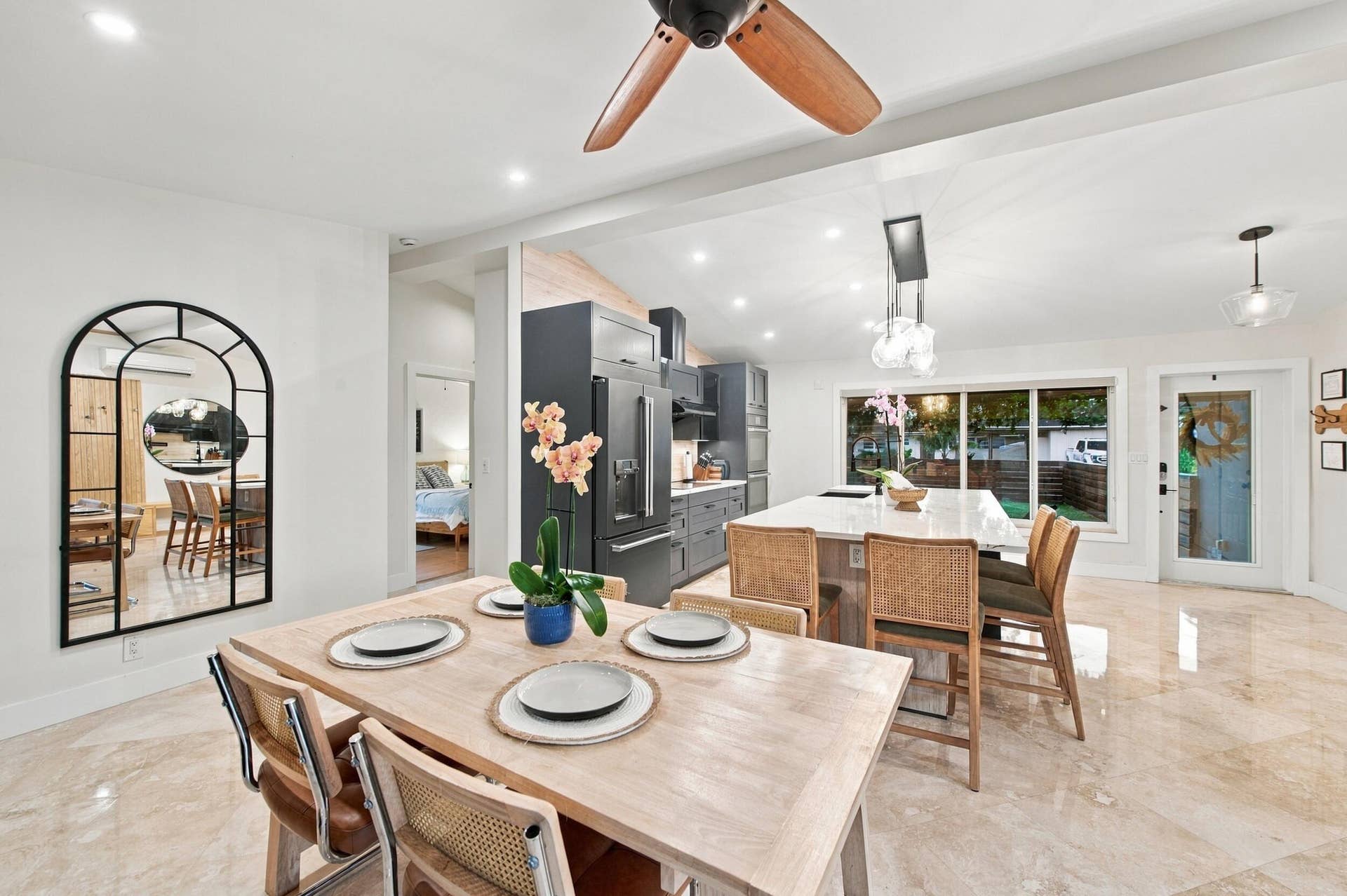 2496 BIMINI Lane, Fort Lauderdale, FL 33312 Open-concept interior featuring recessed lighting, a modern ceiling fan, and light-toned flooring