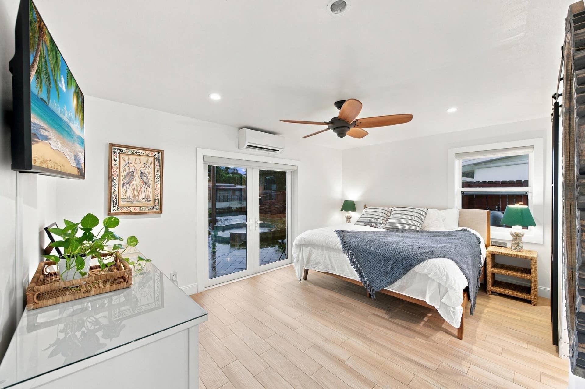 2496 BIMINI Lane, Fort Lauderdale, FL 33312 Light wood-finish flooring, ceiling fan with wood blades, recessed lighting, and white walls