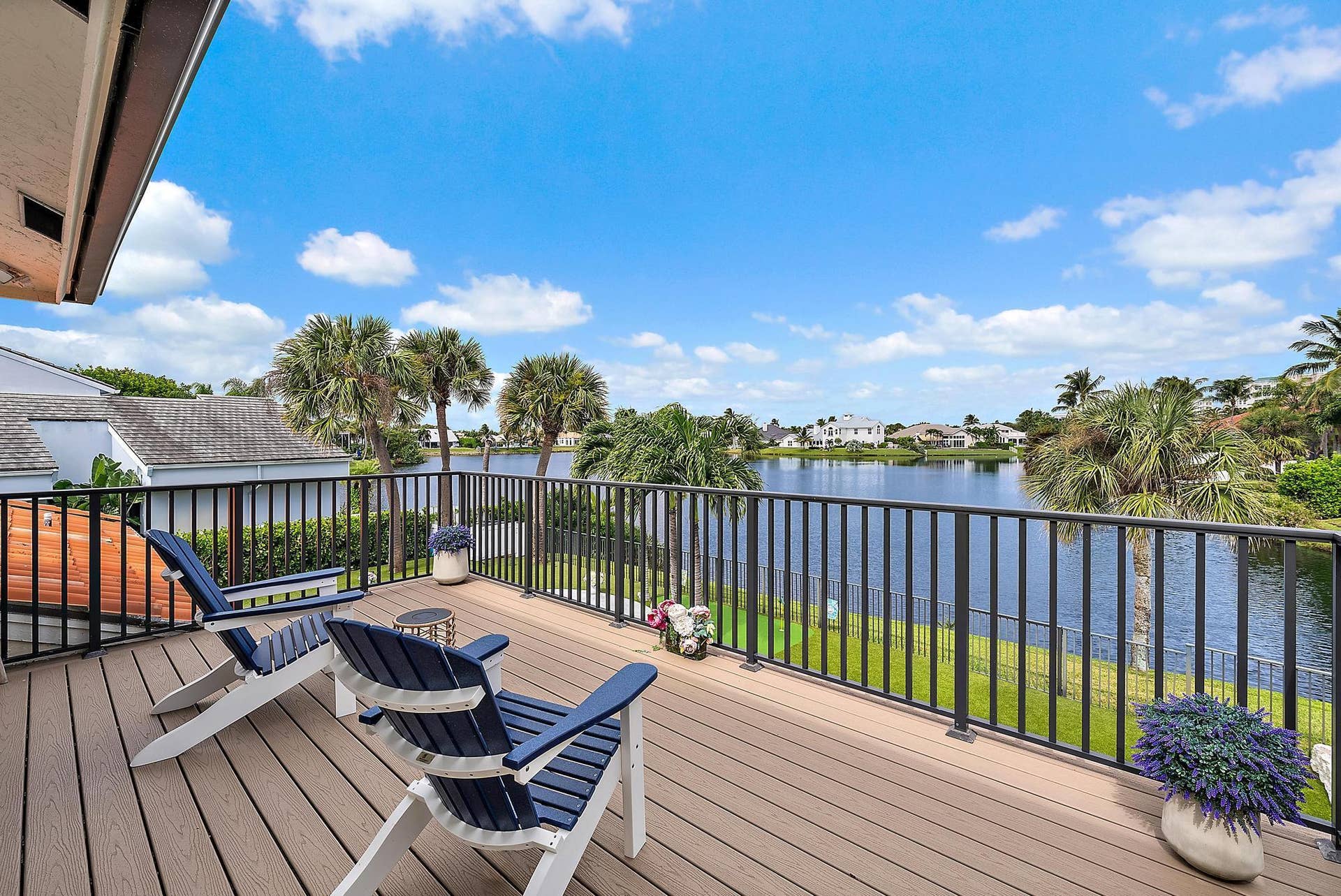 129 Olympus Way, Jupiter, FL 33477 Private Balcony off Owner's suite with panoramic lake views.