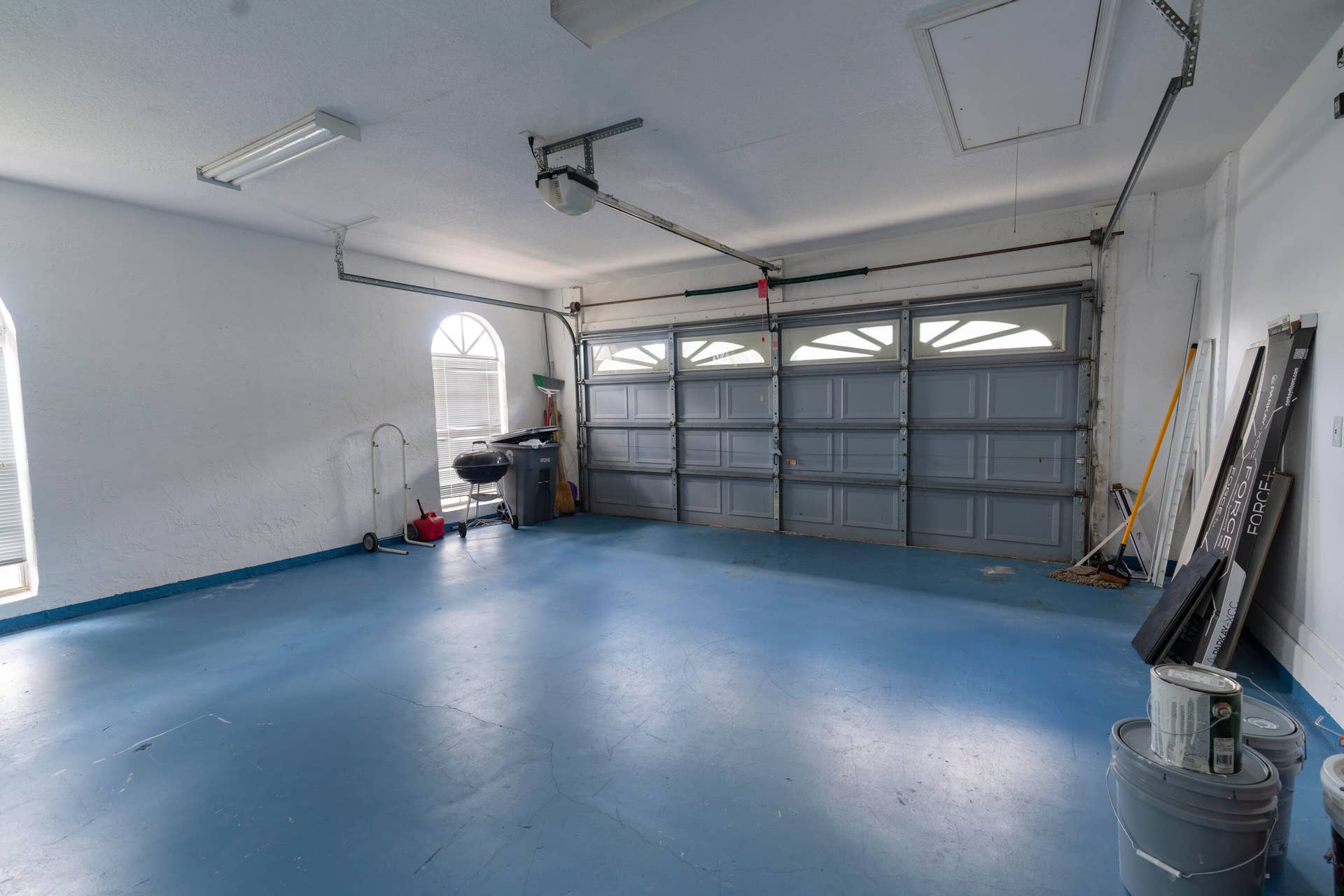 6162 BAY ISLES Drive, Boynton Beach, FL 33437 Automated garage door with upper decorative windows and an access panel