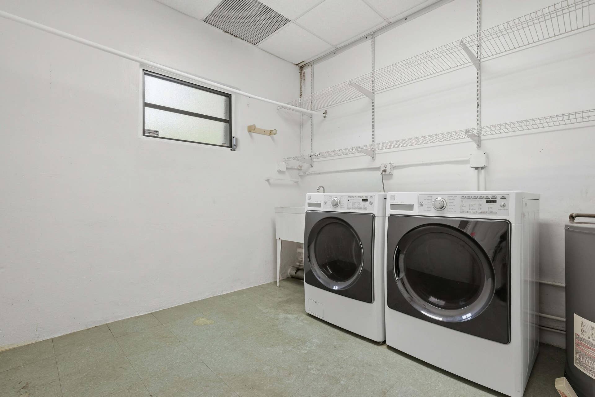 HUGE Laundry room with Front Loaders, laundry tub and room for 2nd bathroom!