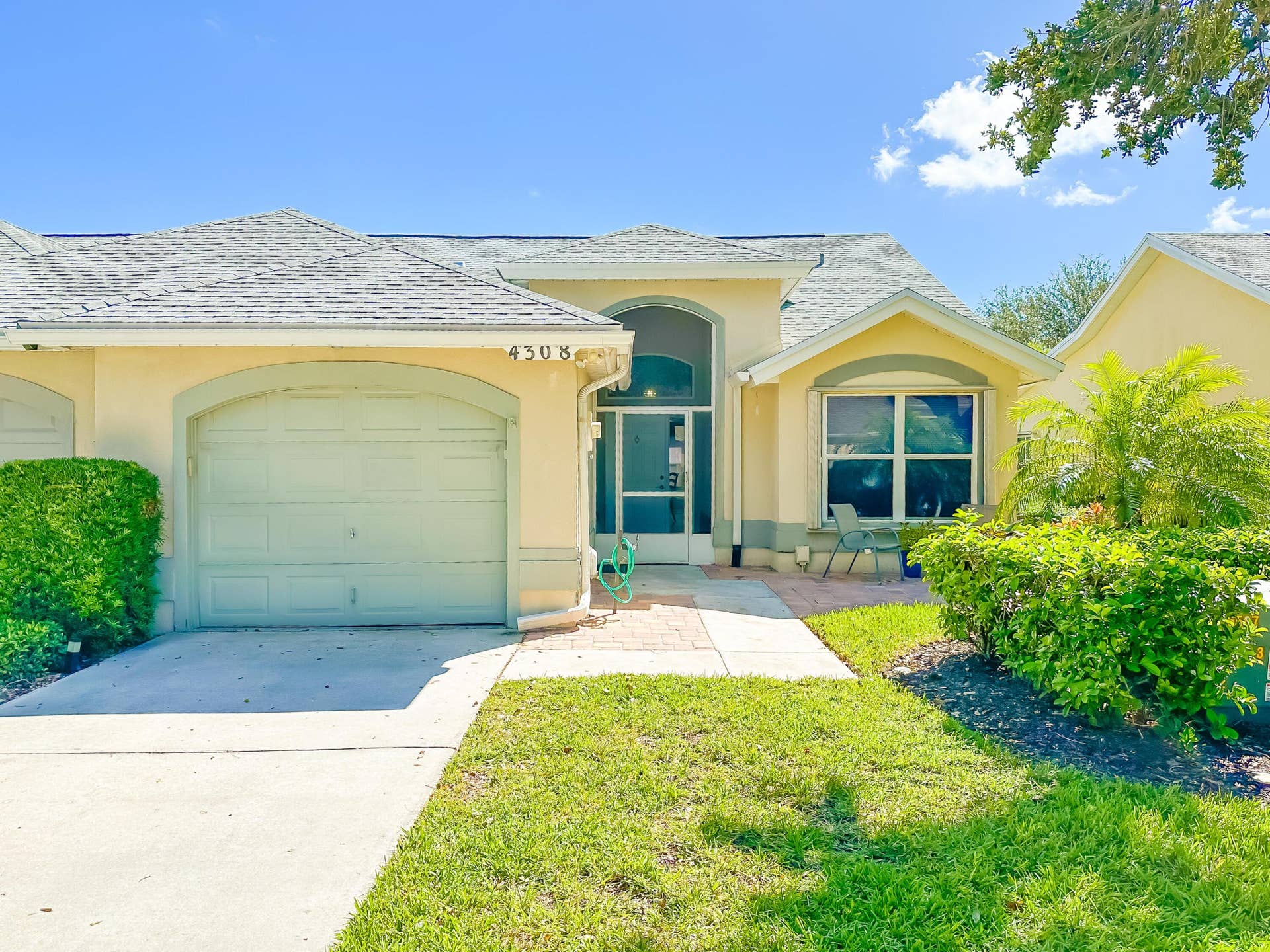 4308 SE BRITTNEY Circle, Port St Lucie, FL 34952 Front of property, from roadway