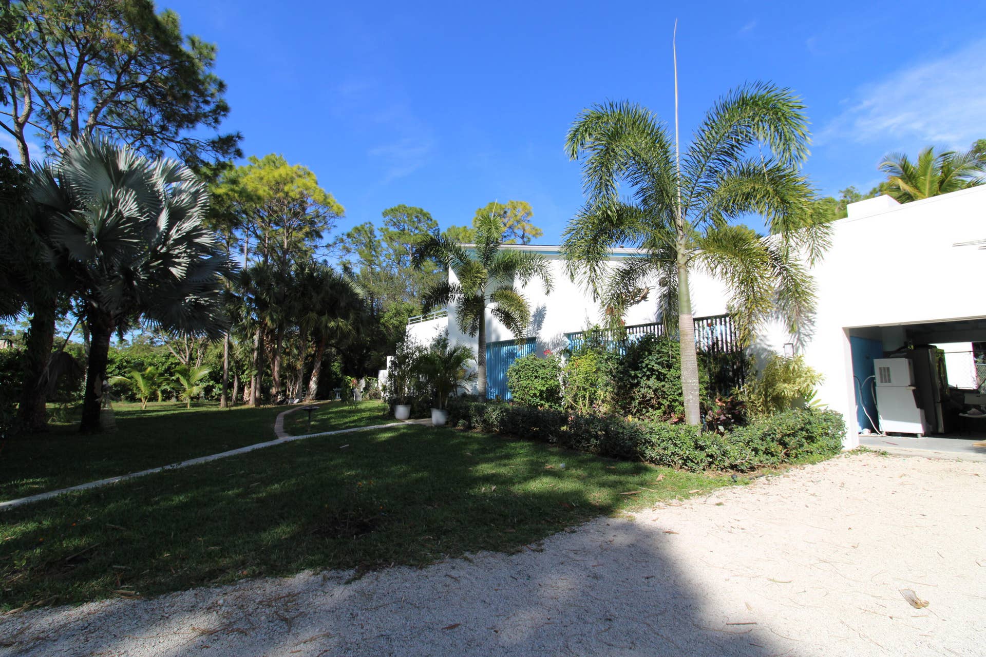 930 Rambling Drive Circle, #LITTLE RANCHES, Wellington, FL 33414 Two space garage and landscaping