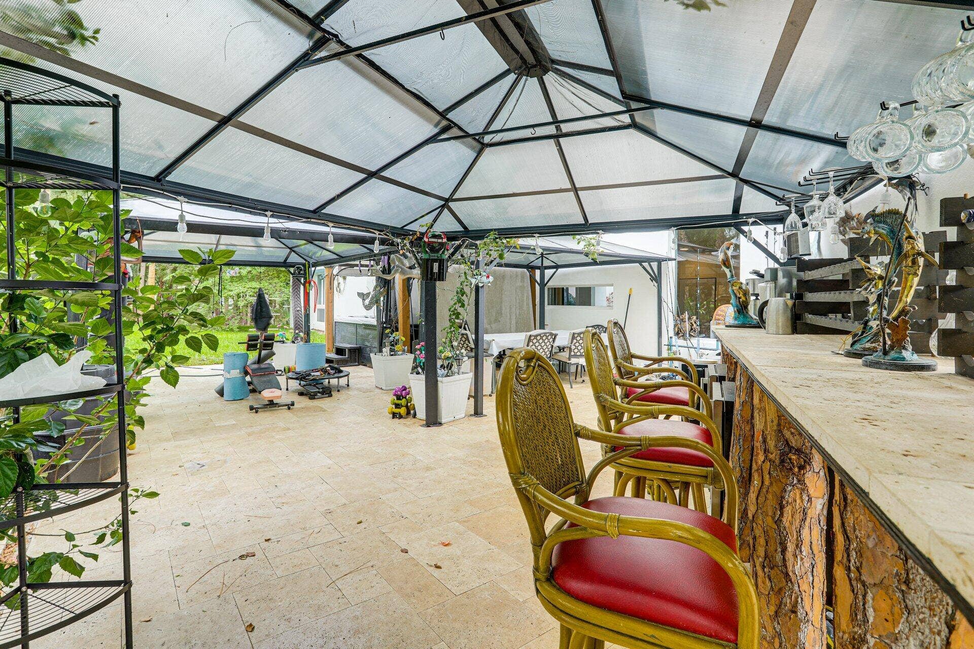 930 Rambling Drive Circle, #LITTLE RANCHES, Wellington, FL 33414 Covered outside dining, bar, gym and luxury spa