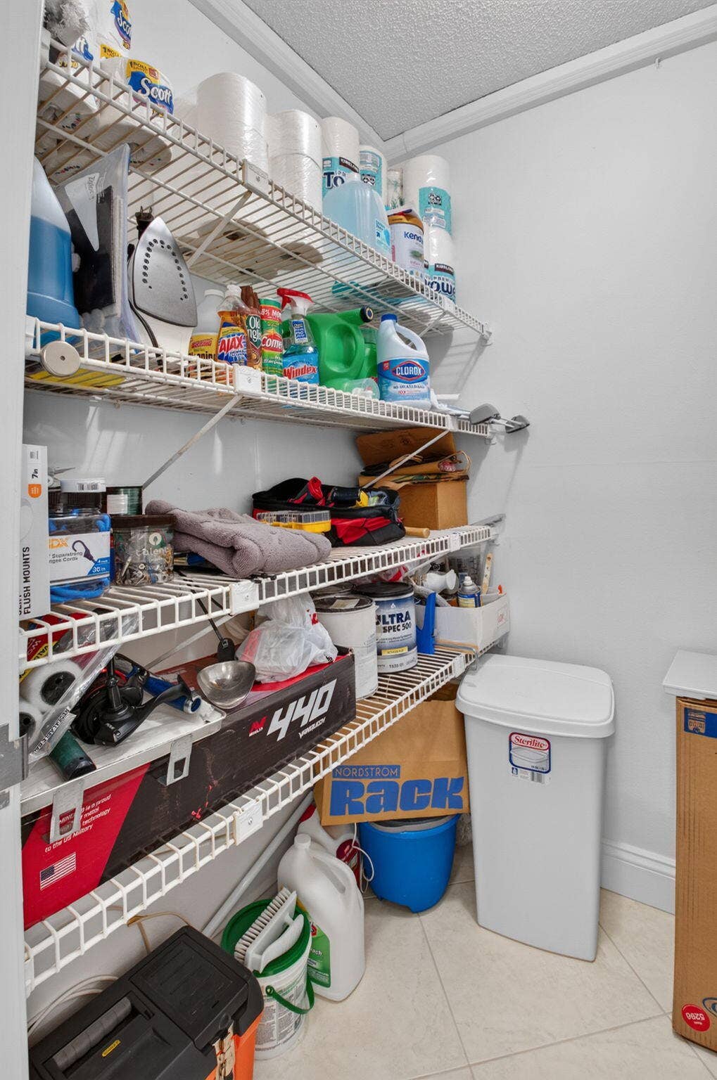A big, walk-in hallway closet stores all your essential and then some!
