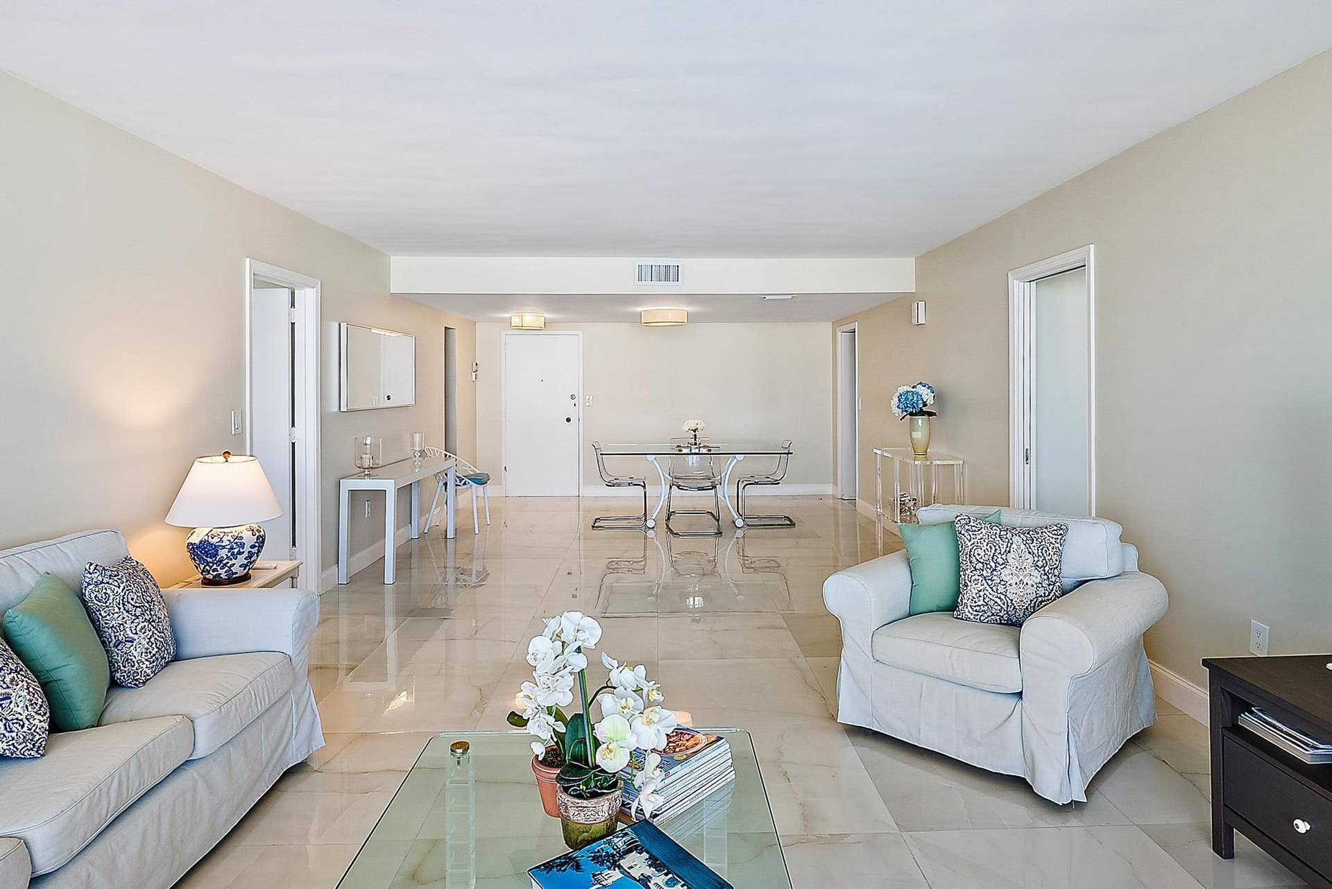 2773 S Ocean Boulevard, #517, Palm Beach, Palm Beach, FL 33480 Expansive open-concept living space with polished tile flooring, recessed lighting, and neutral wall tones