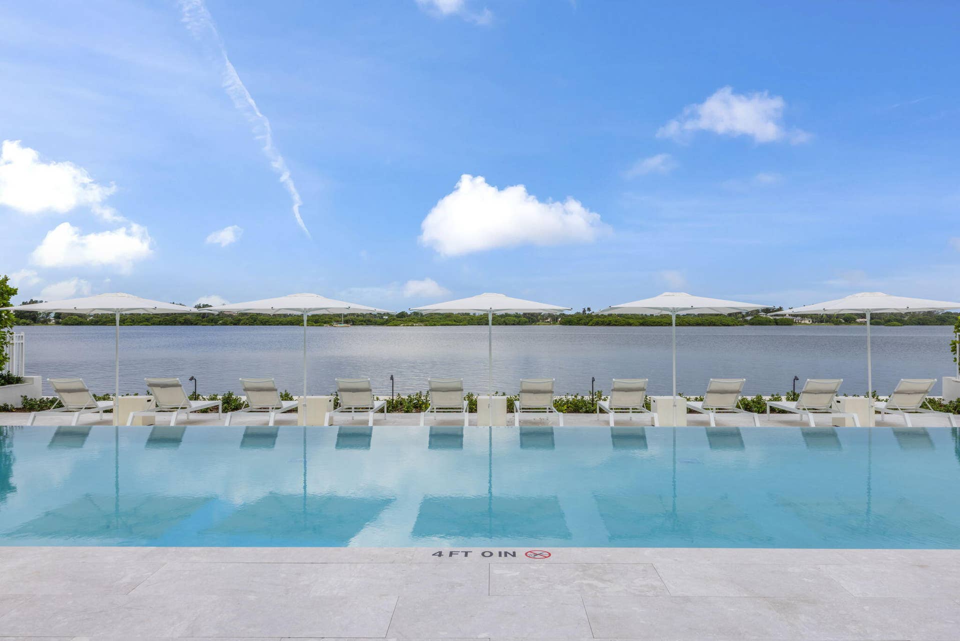 2773 S Ocean Boulevard, #517, Palm Beach, Palm Beach, FL 33480 Infinity-edge pool with surrounding light-toned paving